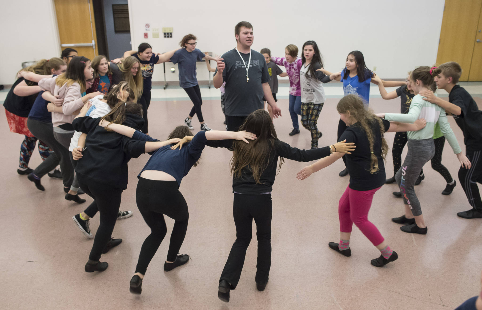 Jared Vance, center, playing Miss Trunchbull, sings during rehearsal of Theater at Latitude 58s production of Matilda at St. Anns Parish Hall on Friday, Nov. 9, 2018. (Michael Penn | Capital City Weekly)