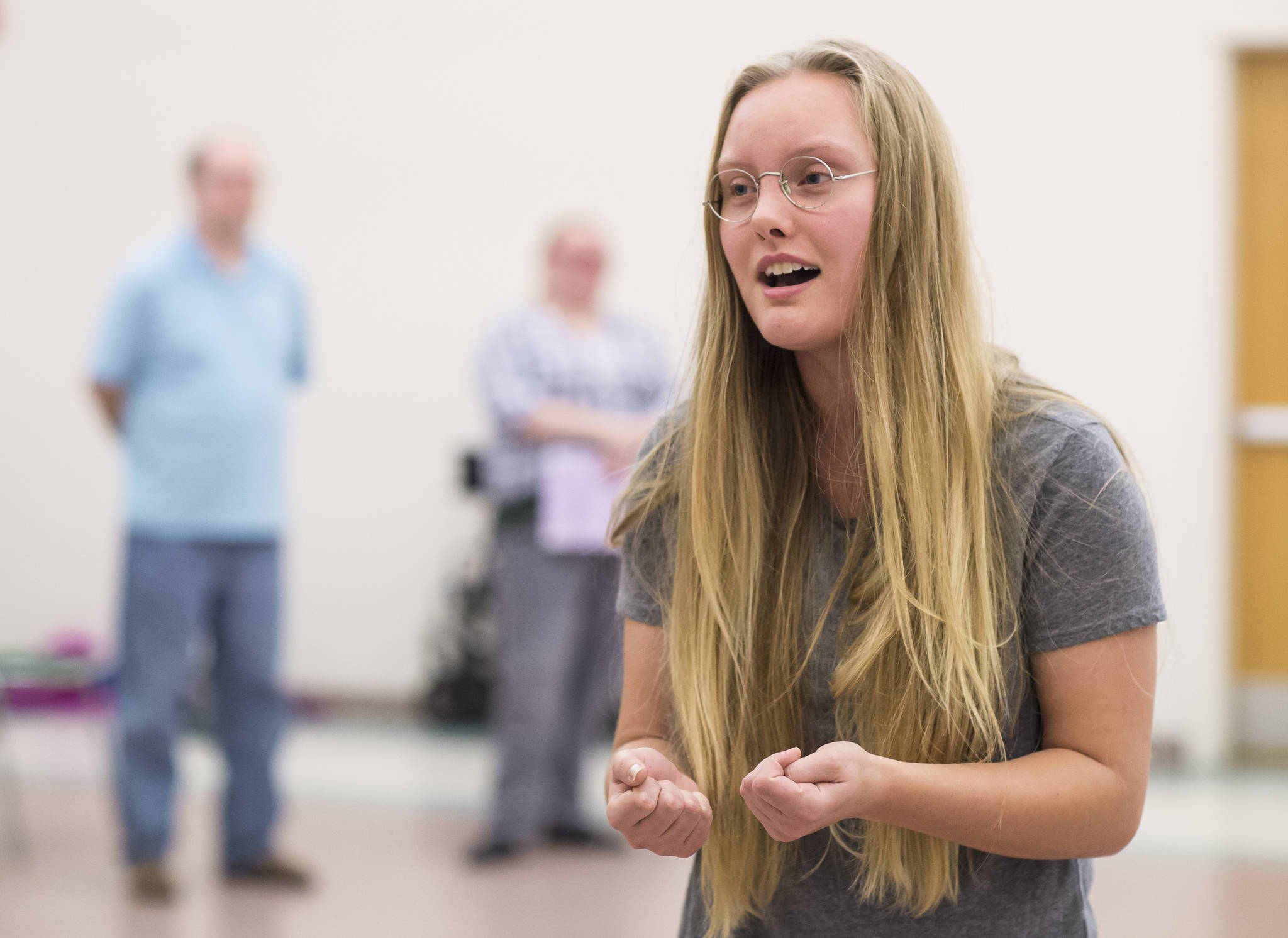 Abigail Zahasky, playing teacher Miss Honey, sings during rehearsal of Theater at Latitude 58’s production of “Matilda” at St. Ann’s Parish Hall on Friday, Nov. 9, 2018. (Michael Penn | Capital City Weekly)
