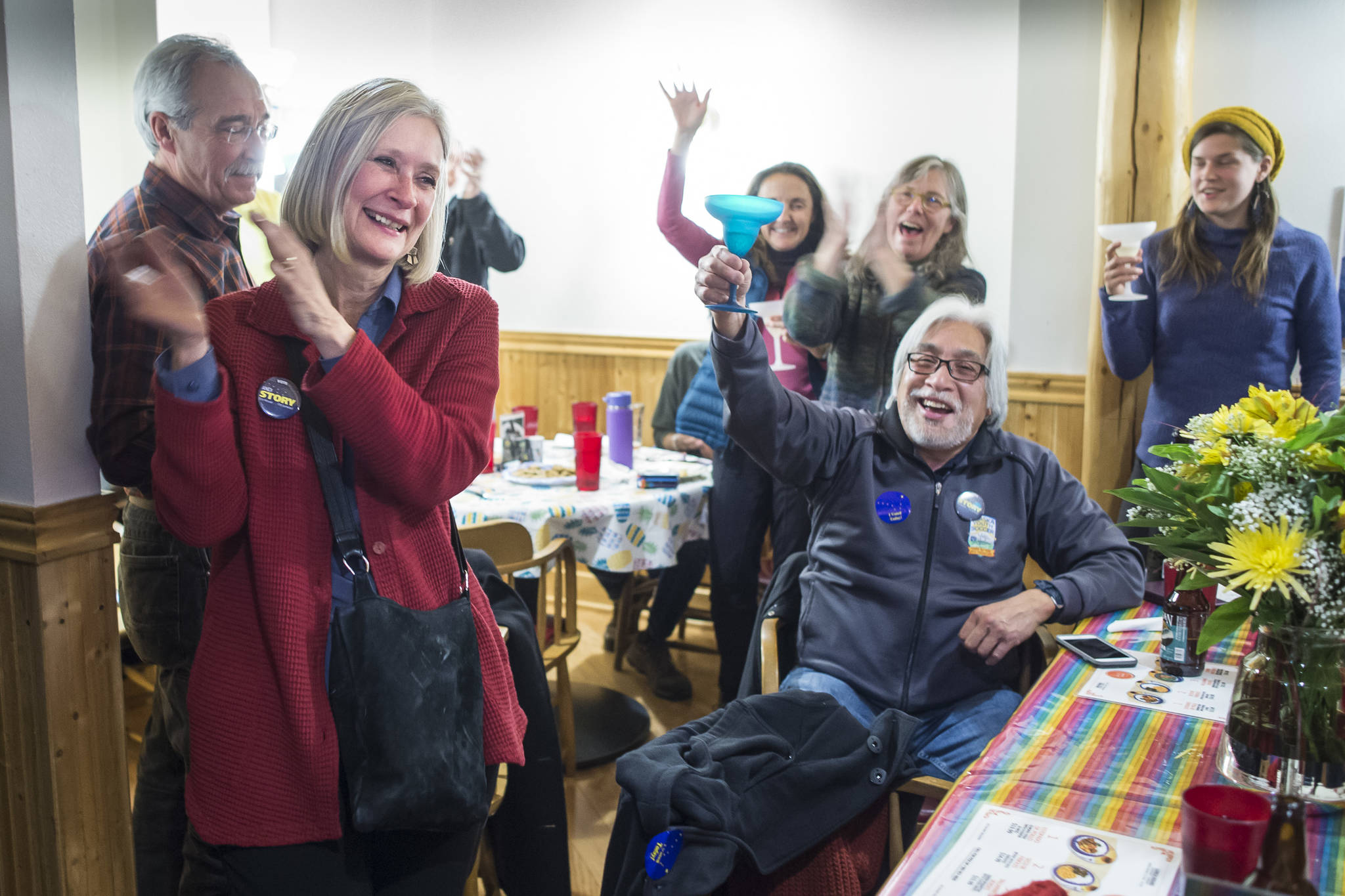 Andi Story, Democratic candidate for House District 34, celebrates her election night win with family on Tuesday. Story defeated Republican candidate Jerry Nankervis to take hold of one of three contested statehouse seats. (Michael Penn | Juneau Empire)