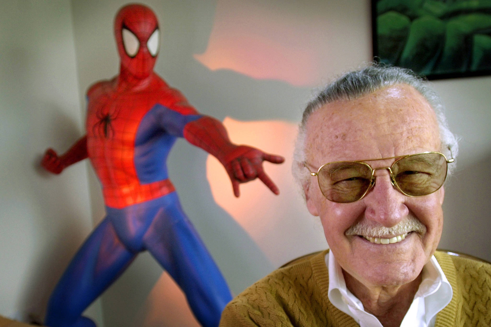 In this April 16, 2002 photo, Stan Lee, creator of comic-book franchises such as “Spider-Man,” “The Incredible Hulk” and “X-Men,” smiles during a photo session in his office in Santa Monica, California. Comic book genius Lee, the architect of the contemporary comic book, has died. He was 95. (Reed Saxon | Associated Press File)