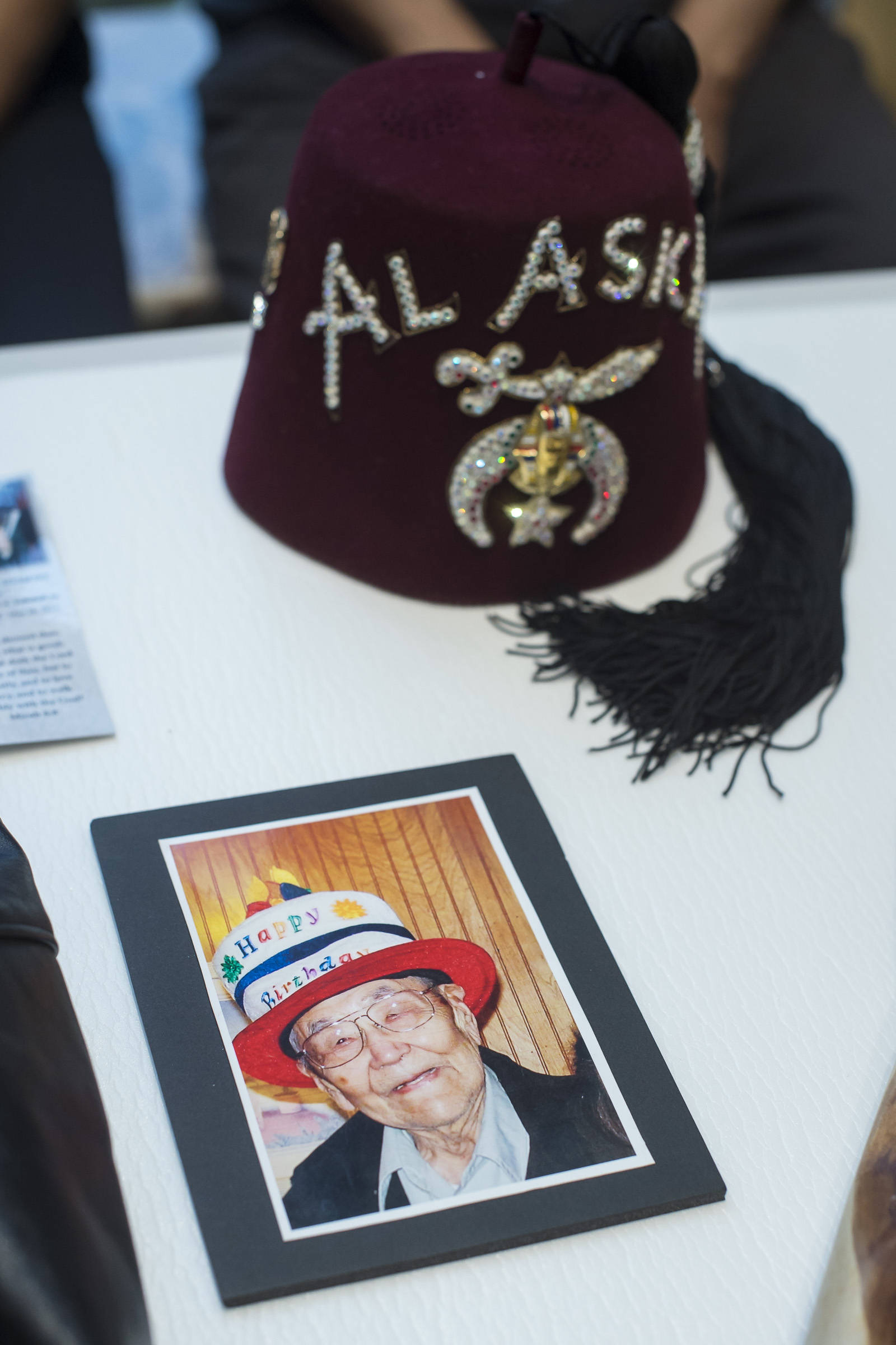 A picture of the Rev. Dr. Walter Soboleff on his 100th Birthday and his hat from the Grand Lodge of Free and Accepted Masons on display at the Walter Soboleff Center on Wednesday, Nov. 14, 2018. Nov. 14 was named Dr. Walter Soboleff Day by the Alaska Legislature in 2014. (Michael Penn | Juneau Empire)