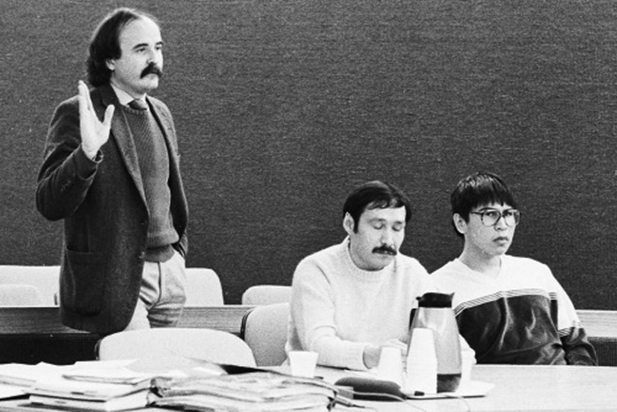 Attorney Ray Brown (left) addresses the court as Emmanuel Telles and Newton Lambert listen during their trial for the 1982 murders of James and Ann Benolken. (Brian Wallace | Juneau Empire File)