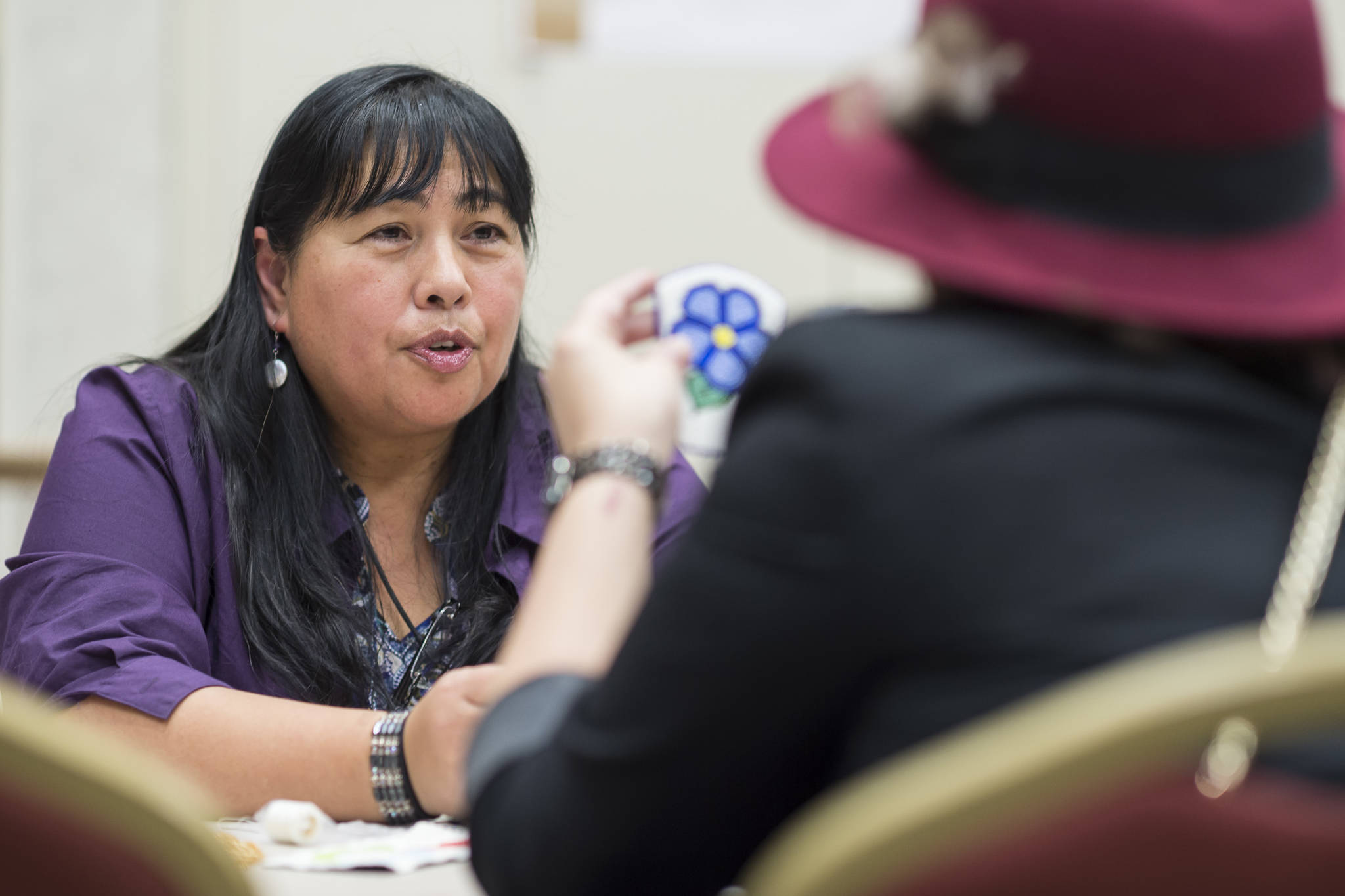 Selena Beierly, left, teaches Carly Jackson about beading at the Celebrating Our Ways of Life for Native American Heritage Month at the Elizabeth Peratrovich Hall on Friday, Nov. 16, 2018. (Michael Penn | Juneau Empire)