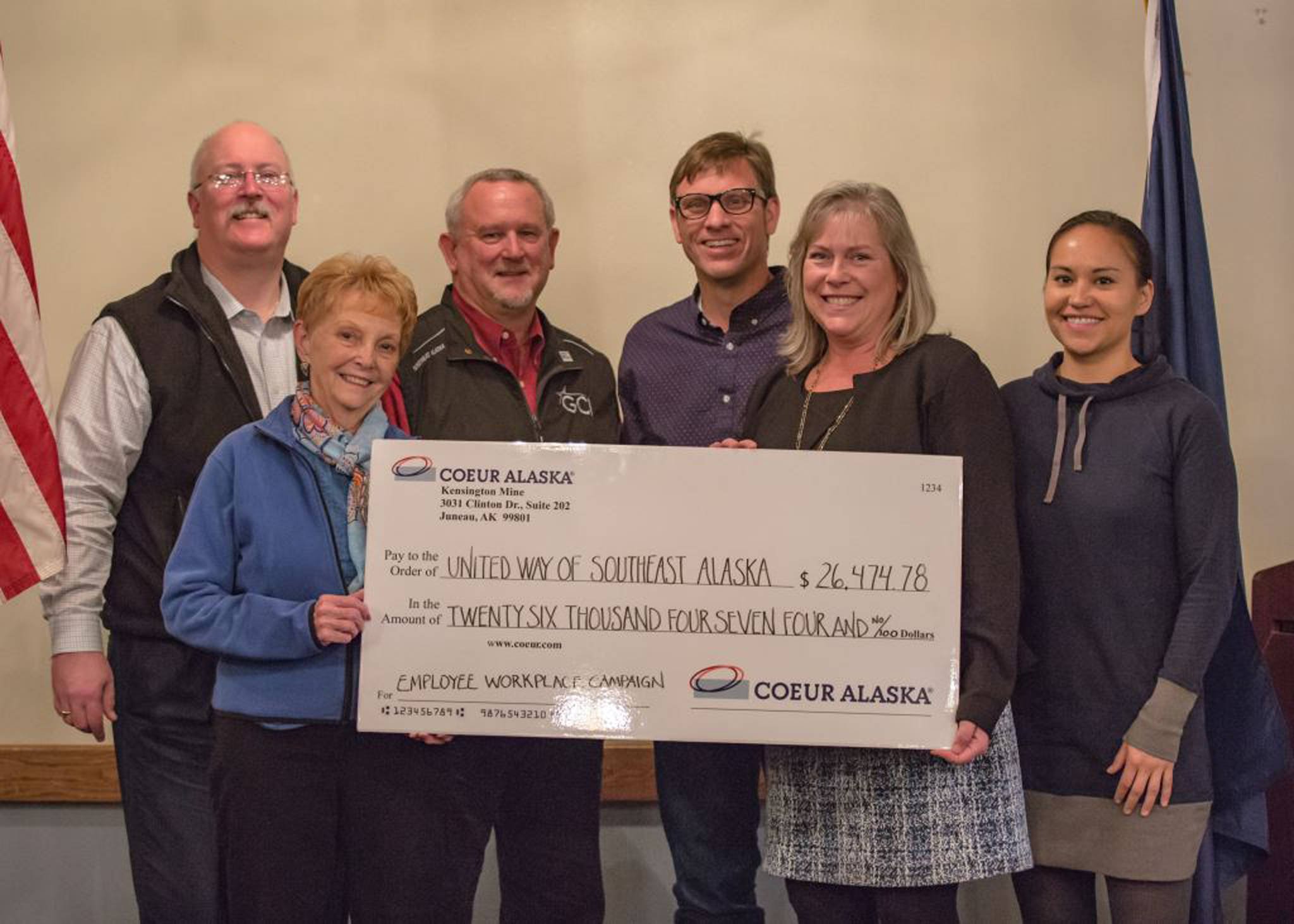 Mark Kiessling, General Manager of Coeur Alaska, Kensington Mine presents a check for $26,474.78 to Warren Russell, Chair of the United Way of Southeast Alaska Board. This amount represents the pledged amount for the 2017 annual campaign of $21,474.78 from 56 employees of Coeur Alaska Kensington Mine and a matching corporate gift of $5,000 from Coeur Alaska, Kensington Mine. In making the presentation at the Nov. 15 Juneau Chamber Luncheon Kiessling noted that, “small contributions in large volumes from a number of people can make a huge difference in our community.”