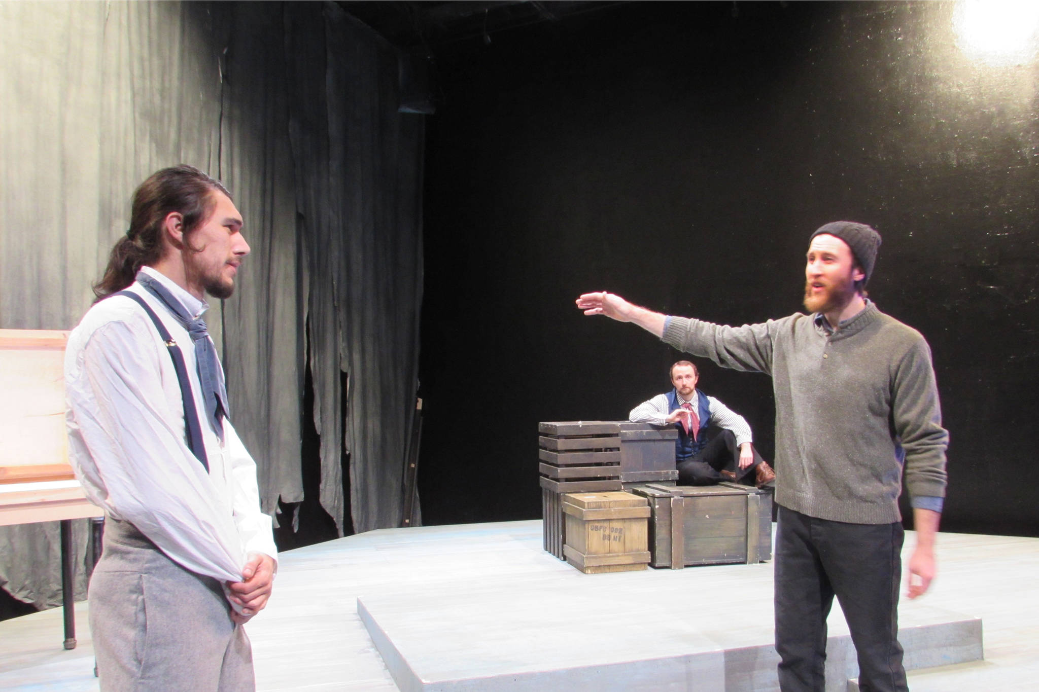 Charles Johnson, portrayed by Skyler Ray-Benson Davis, and John Handford, portrayed by Travis Morris, exchange terse words during rehearsal for “Franklin” while Henry Said, portrayed by Connor Chaney, looks on. (Ben Hohenstatt | Capital City Weekly)