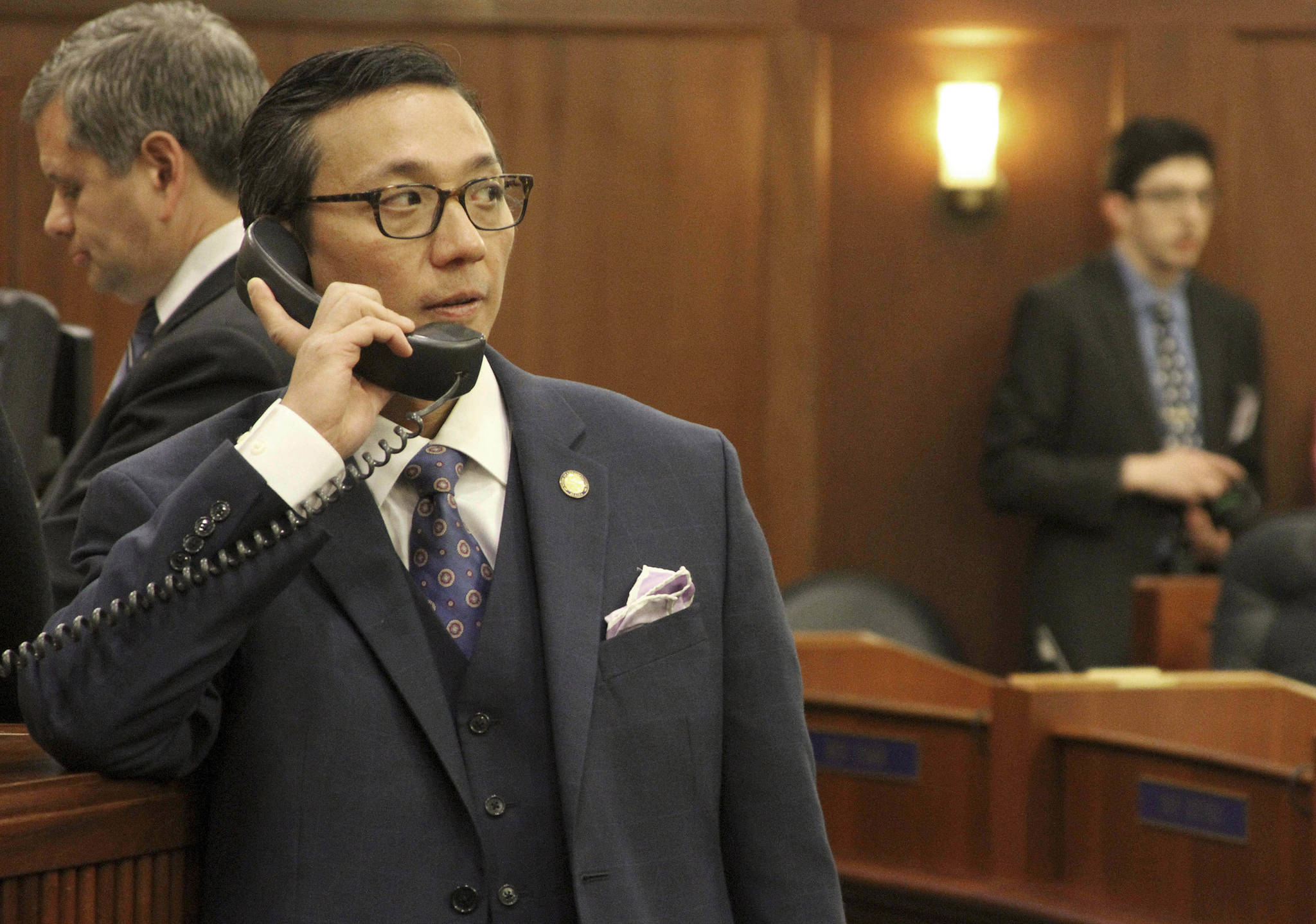 This Jan. 16 photo shows Alaska state Rep. Scott Kawasaki, a Fairbanks Democrat, talking on a telephone before the start of the legislative session at the state Capitol in Juneau, Alaska. Republican Alaska Senate President Pete Kelly appears to have lost his re-election bid but told The Associated Press that he’s leaving open the option of a recount. Ballots tallied Friday, Nov. 16, 2018 show Kawasaki widening his lead to 173 votes in the Fairbanks race. (Mark Thiessen | The Associated Press File)