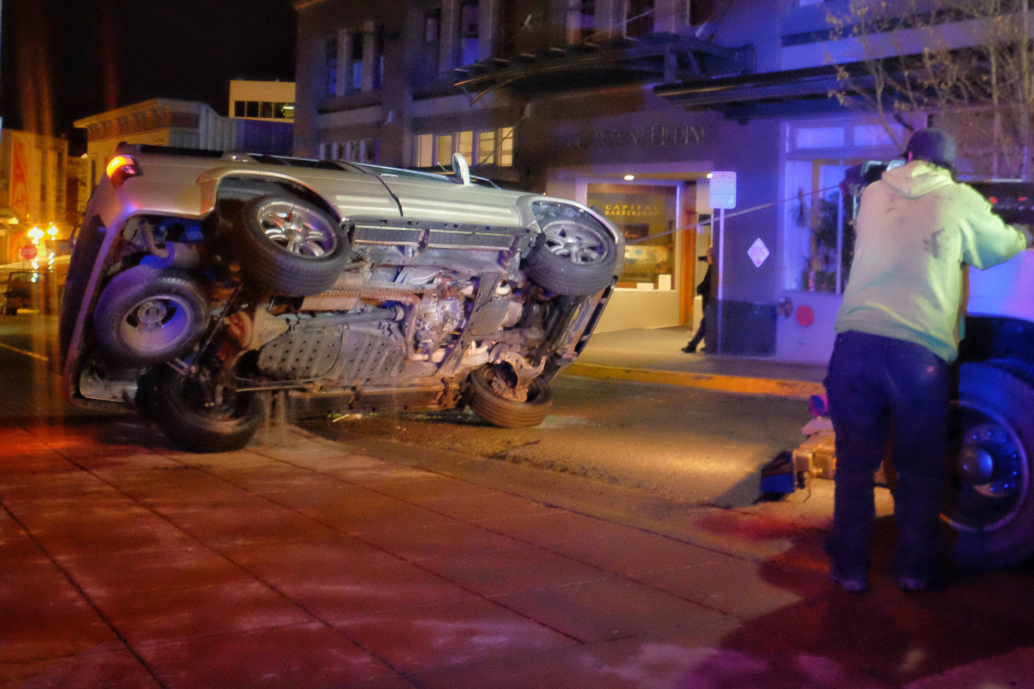 An SUV sits on its side after colliding with a concrete planter at the corner of Seward Street and Second Street on Thursday, Jan 18. The driver and sole passenger were taken to the hospital for injuries that were not life-threatening. (Courtesy photo | Jessie Herman-Haywood)