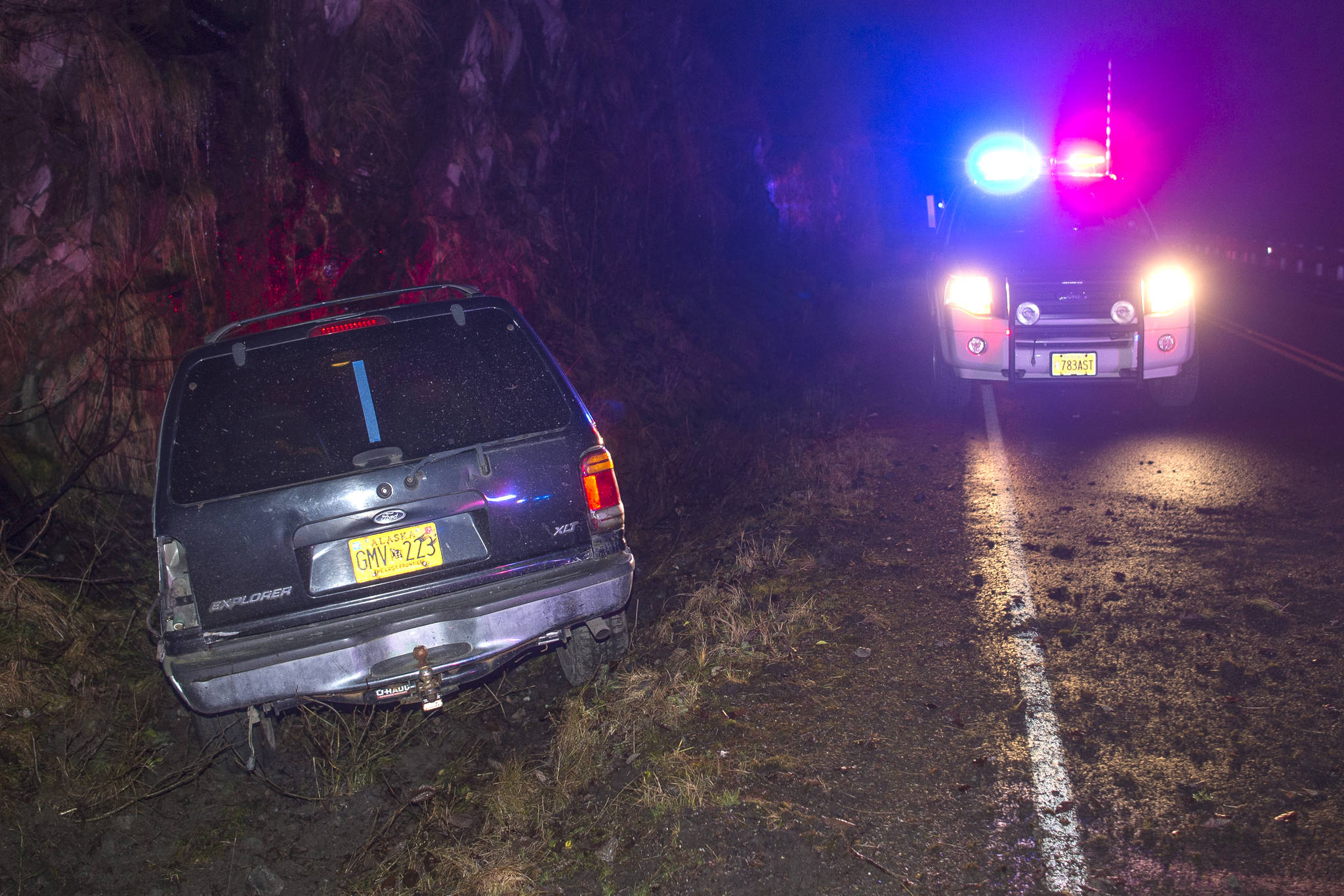 A vehicle sits in a ditch along Thane Road after the driver fell asleep on Tuesday, Nov. 27, 2018. The driver was taken to Bartlett Regional Hospital. (Michael Penn | Juneau Empire)