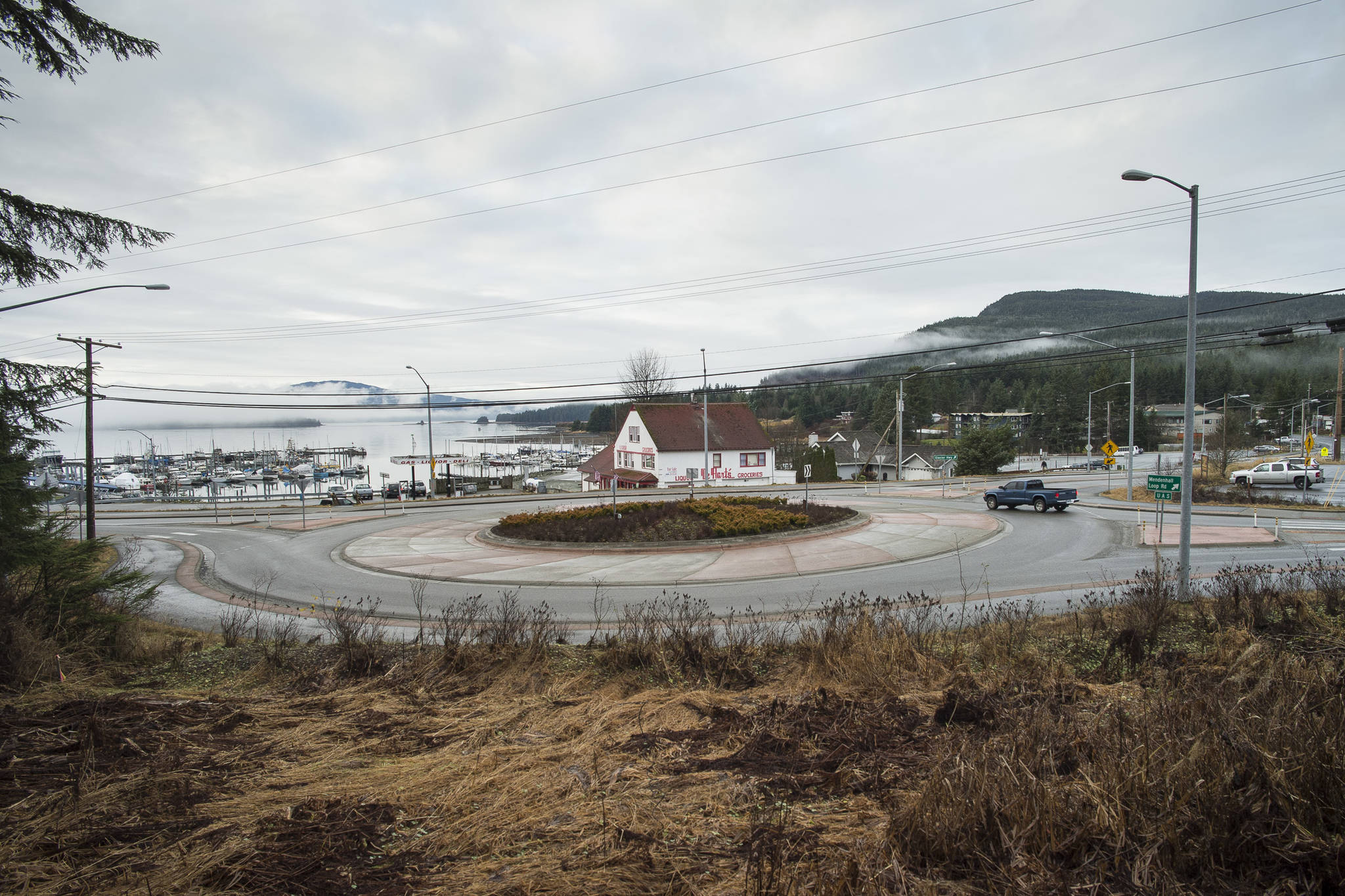 Businesses, schools, churches and public facilities line Veterans Memorial Highway running through Auke Bay on Wednesday, Nov. 28, 2018. The Planning Commission’s Auke Bay Implementation Committee is in the midst of drafting an ordinance to create a Community Mixed Use zoning district and an Auke Bay Overlay district. (Michael Penn | Juneau Empire)