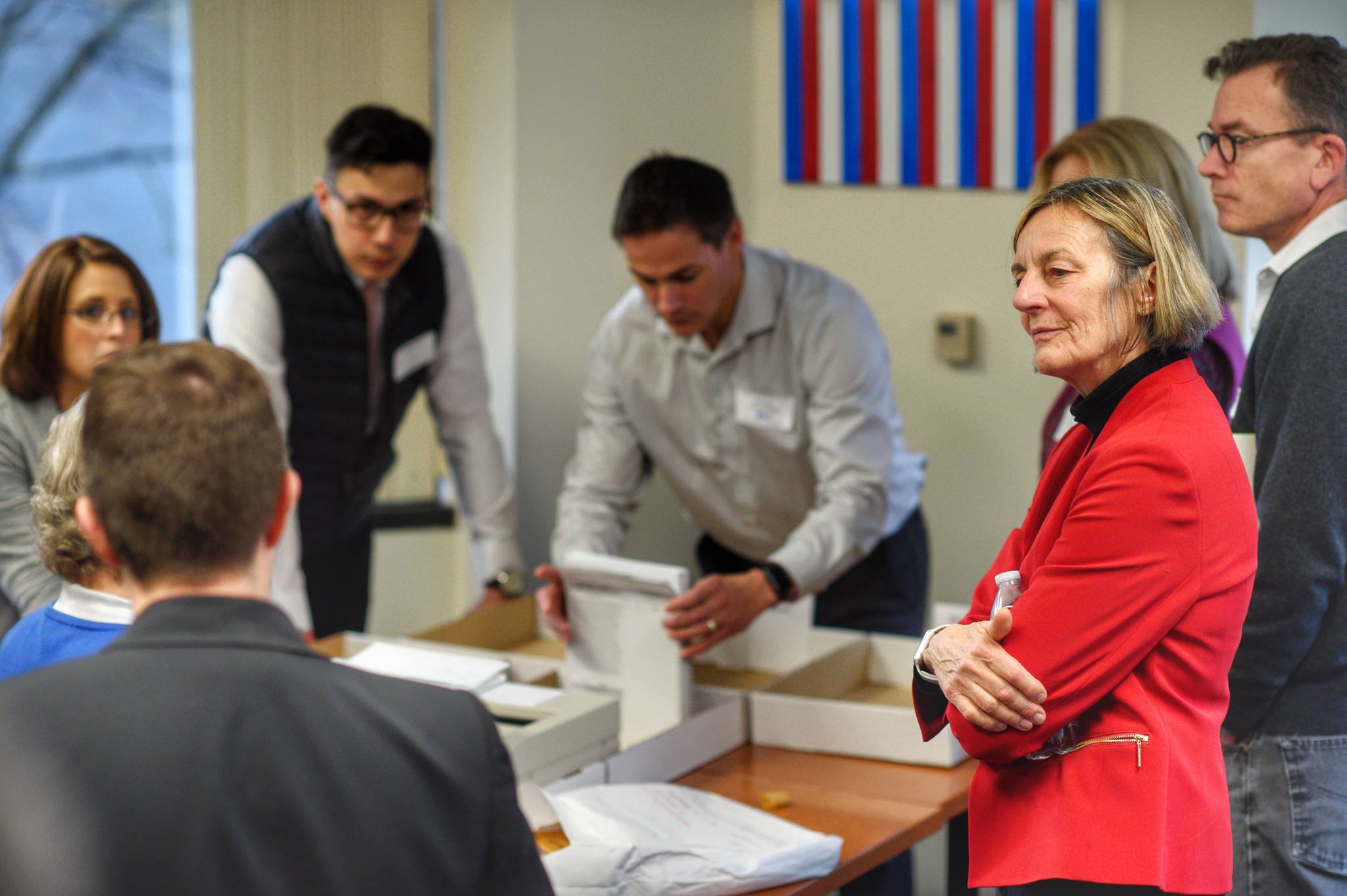 House District 1 Democratic candidate Kathryn Dodge watches as ballots are counted during a recount at the Division of Elections office in Juneau on Friday, Nov. 30, 2018. (Michael Penn | Juneau Empire)
