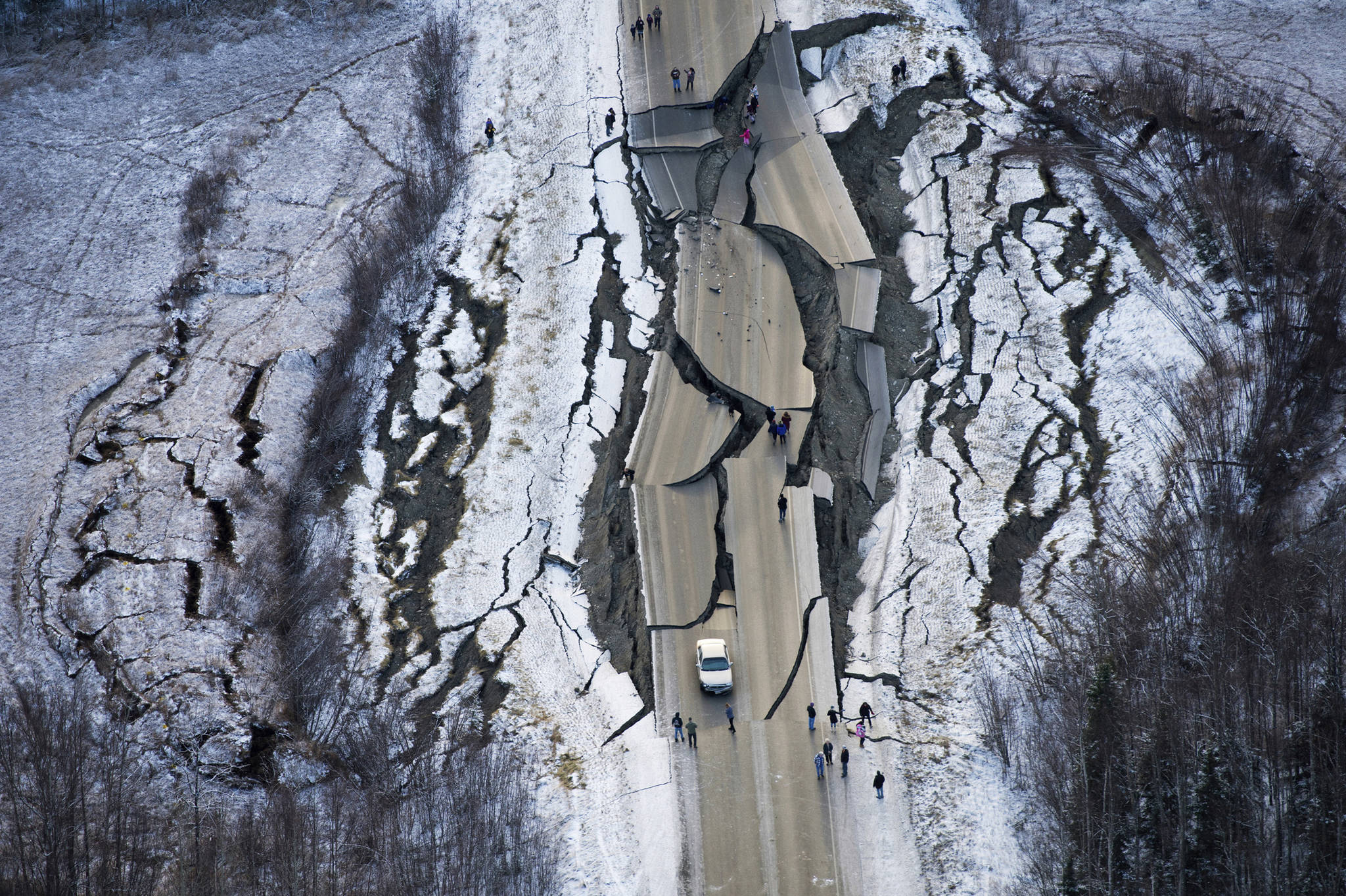 This aerial photo shows damage on Vine Road, south of Wasilla, Alaska, after earthquakes Friday, Nov. 30, 2018. Back-to-back earthquakes measuring 7.0 and 5.7 shattered highways and rocked buildings Friday in Anchorage and the surrounding area, sending people running into the streets and briefly triggering a tsunami warning for islands and coastal areas south of the city. (Marc Lester | Anchorage Daily News)