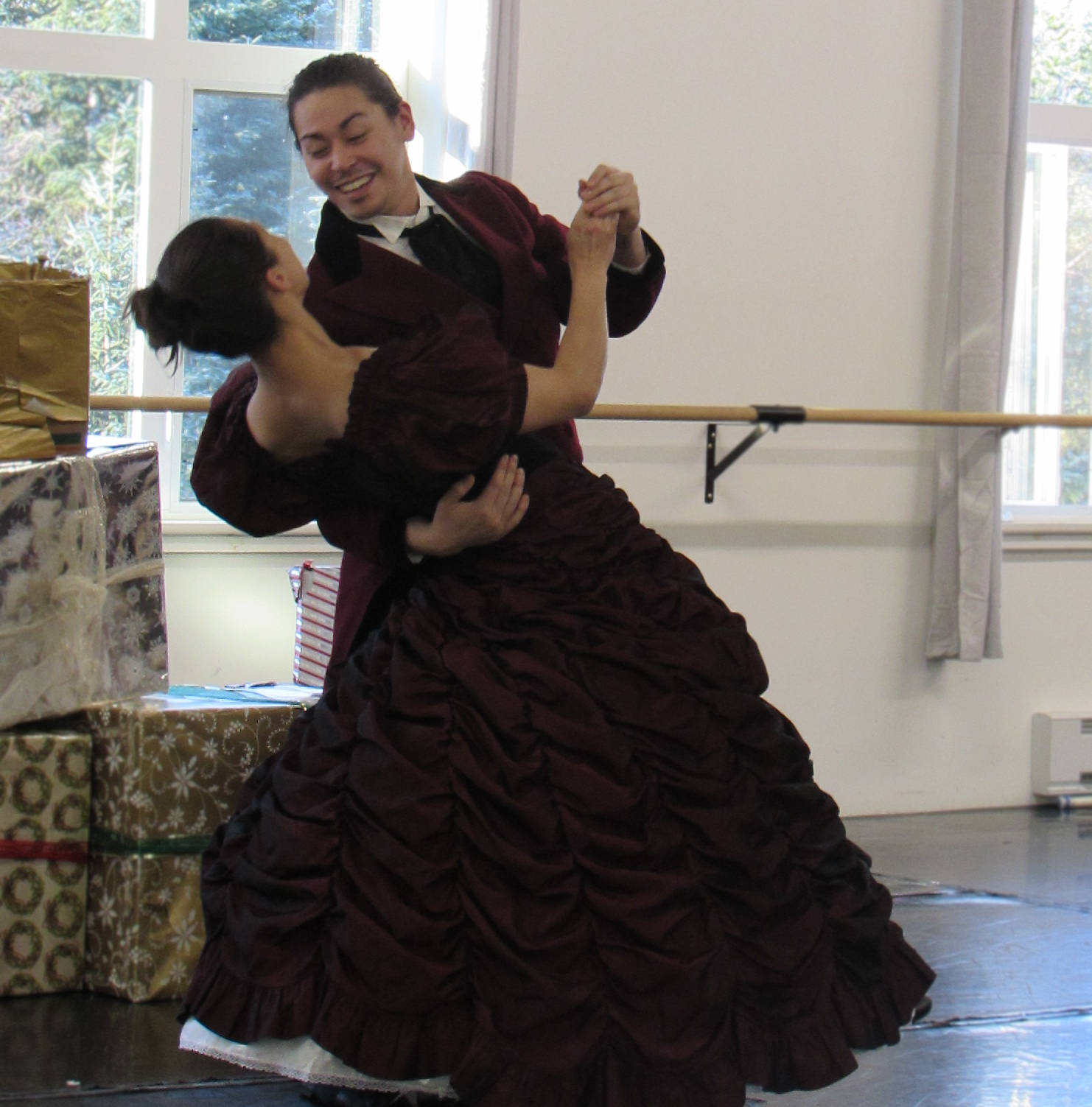 Ty Yamaoka as Herr Stahlbaum dips Frau Stahlbaum as played by Alisha Falberg during rehearsal for the upcoming Juneau Dance Theatre production of “The Nutcracker.” (Ben Hohenstatt | Capital City Weekly)