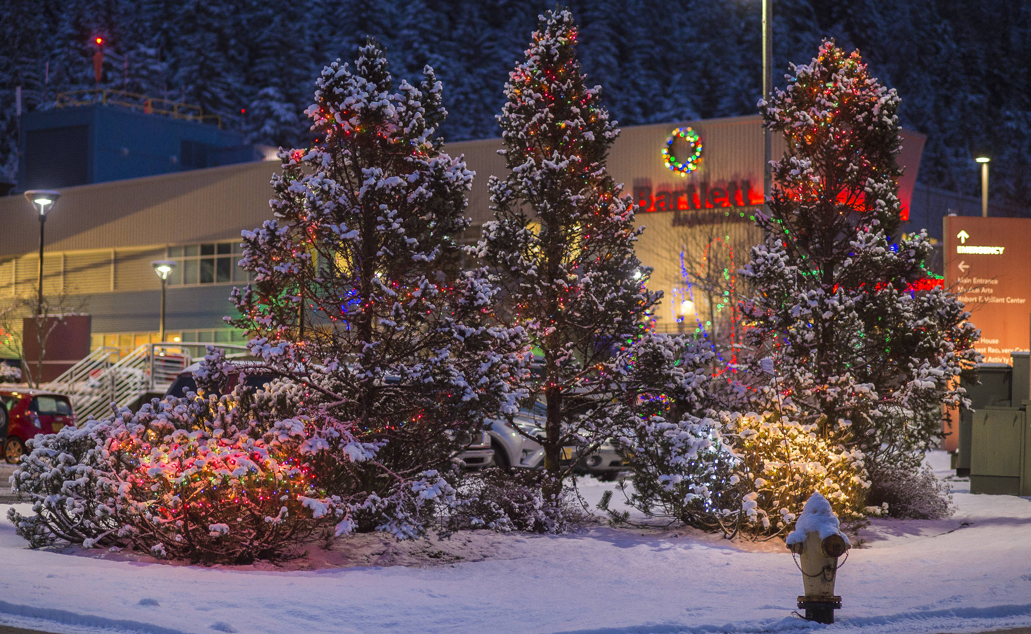 Christmas lights decorate the entrance to Bartlett Regional Hospital on Friday, Dec. 21, 2018. (Michael Penn | Juneau Empire)