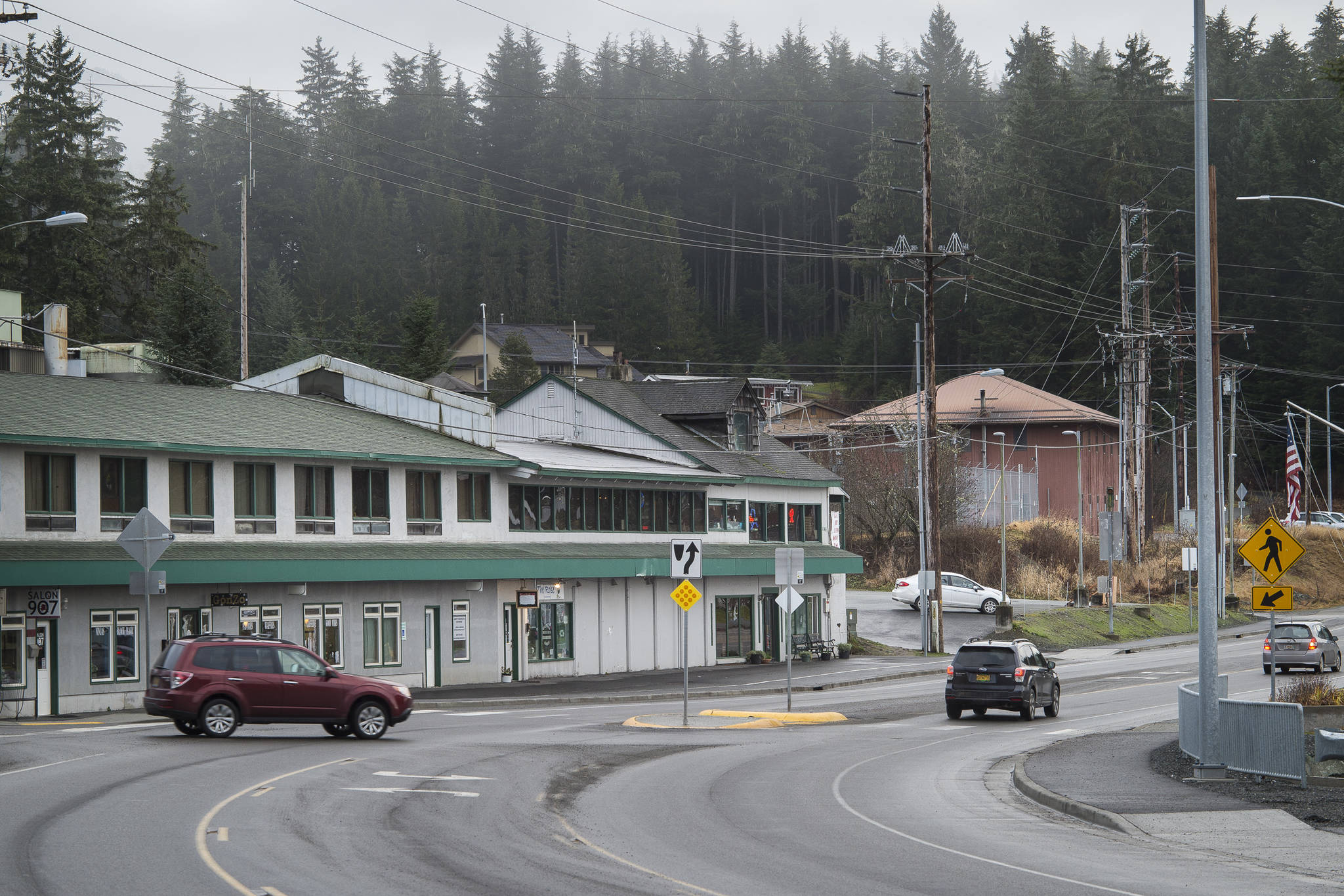 Businesses, schools, churches and public facilities line Veterans Memorial Highway running through Auke Bay on Wednesday, Nov. 28, 2018. The Planning Commission’s Auke Bay Implementation Committee is in the midst of drafting an ordinance to create a Community Mixed Use zoning district and an Auke Bay Overlay district. (Michael Penn | Juneau Empire)