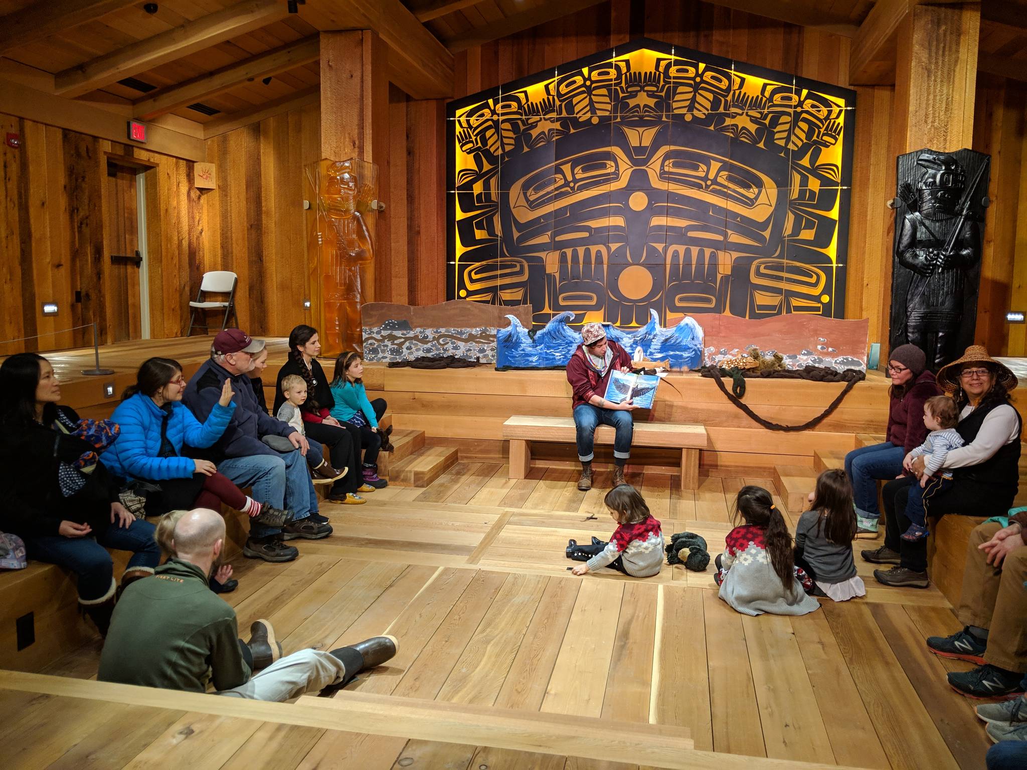 Youngsters were excited to hear stories from the Baby Raven Reads series during Gallery Walk at Sealaska Heritage Institute’s Walter Soboleff Building, Friday, Dec. 18, 2018.
