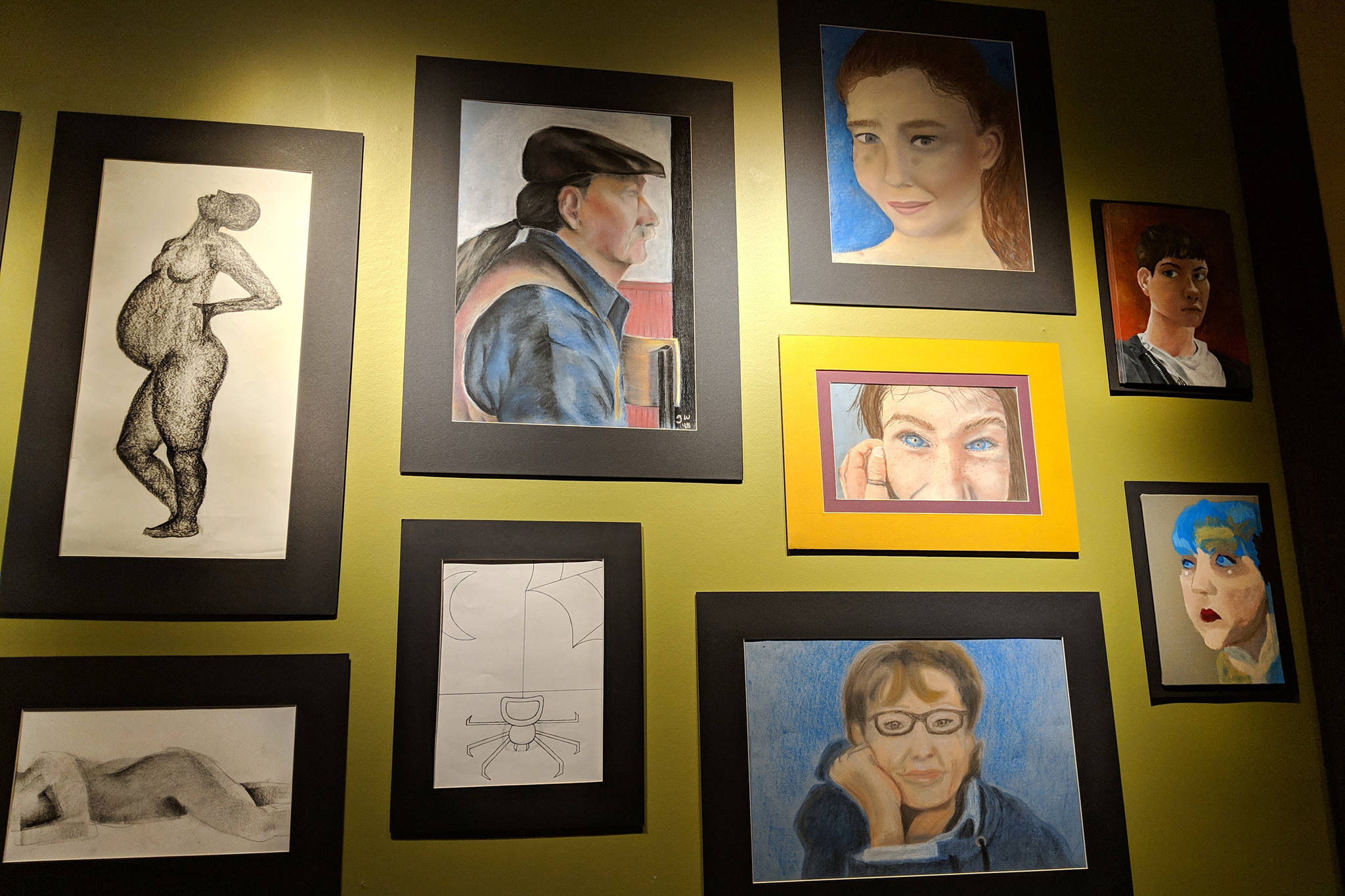 Artwork by Juneau-Douglas High School students was displayed during the Juneau Youth Services student art show at Baranof Heritage Cafe on Friday, Dec. 7, 2018. (Ben Hohenstatt | Capital City Weekly)