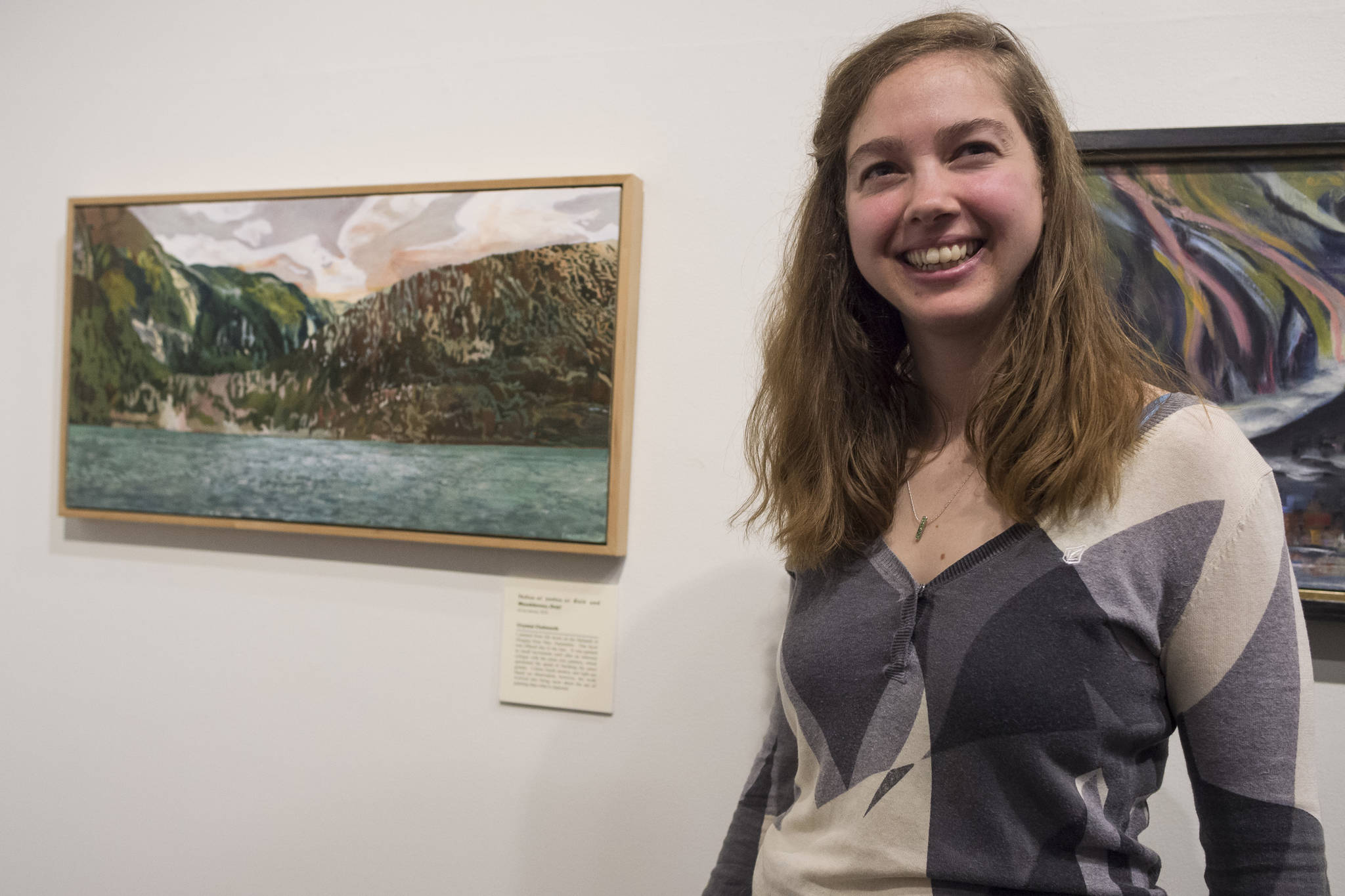 Crystal Cudworth is one of 19 Plein Rein Painters inspired by Sydney Laurence at the Juneau-Douglas City Museum during Gallery Walk on Friday, Dec. 7, 2018. (Michael Penn | Juneau Empire)