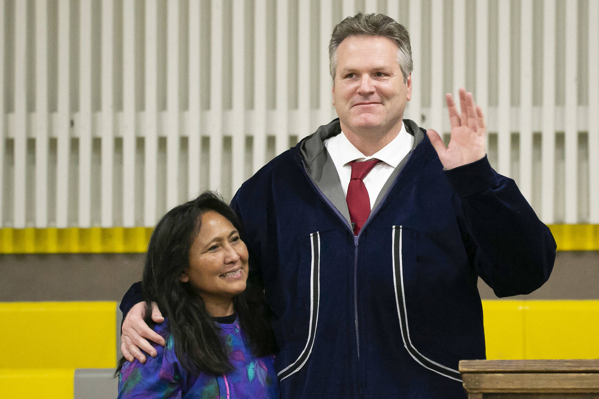 Alaska Gov. Mike Dunleavy poses with first lady Rose Dunleavy after he was sworn into office Monday, Dec. 3, 2018, in Kotzebue, Alaska. He had originally planned the ceremony in her hometown of Noorvik, Alaska, but poor weather prevented his plane from landing there and the ceremony was moved to Kotzebue.(Stanley Wright | Alaska Governor’s Office via AP)