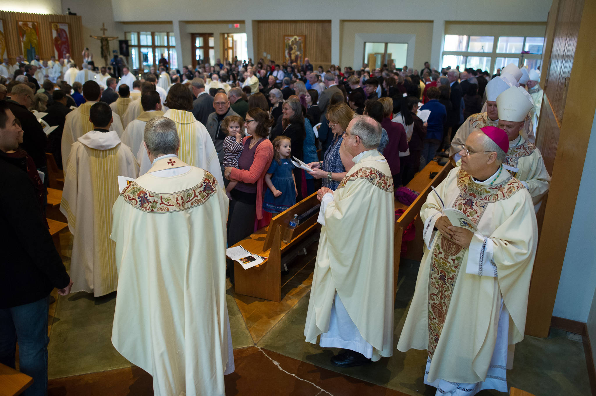 Priests from around Alaska along with Father Andrew E. Bellisario, right, enter St. Paul the Apostle Catholic Church for his Ordination and Installation as the Sixth Bishop of the Diocese of Juneau on Tuesday, Oct. 10, 2017. (Michael Penn | Juneau Empire File)