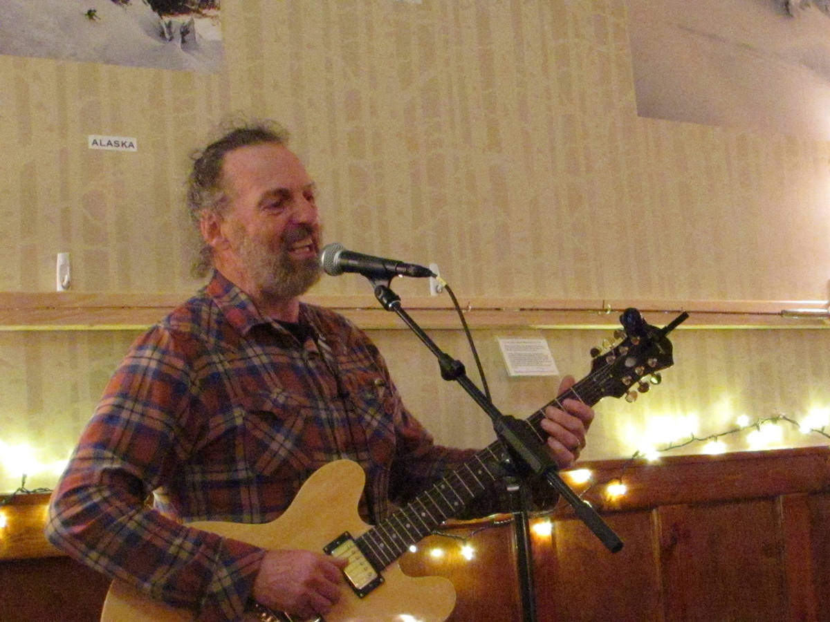 Carl Reese performs an original song at the final Mountainside Open Mic of the season, Thursday, Dec. 18, 2018. (Ben Hohenstatt | Capital City Weekly)