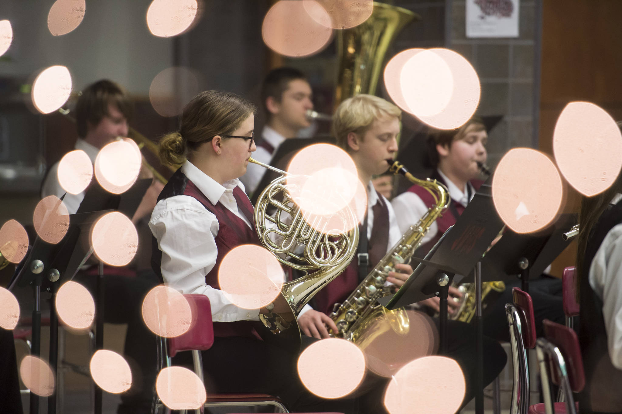 Students with the Juneau-Douglas High School Concert Band play during a holiday music concert at JDHS on Thursday, Dec. 13, 2018. (Michael Penn | Juneau Empire)