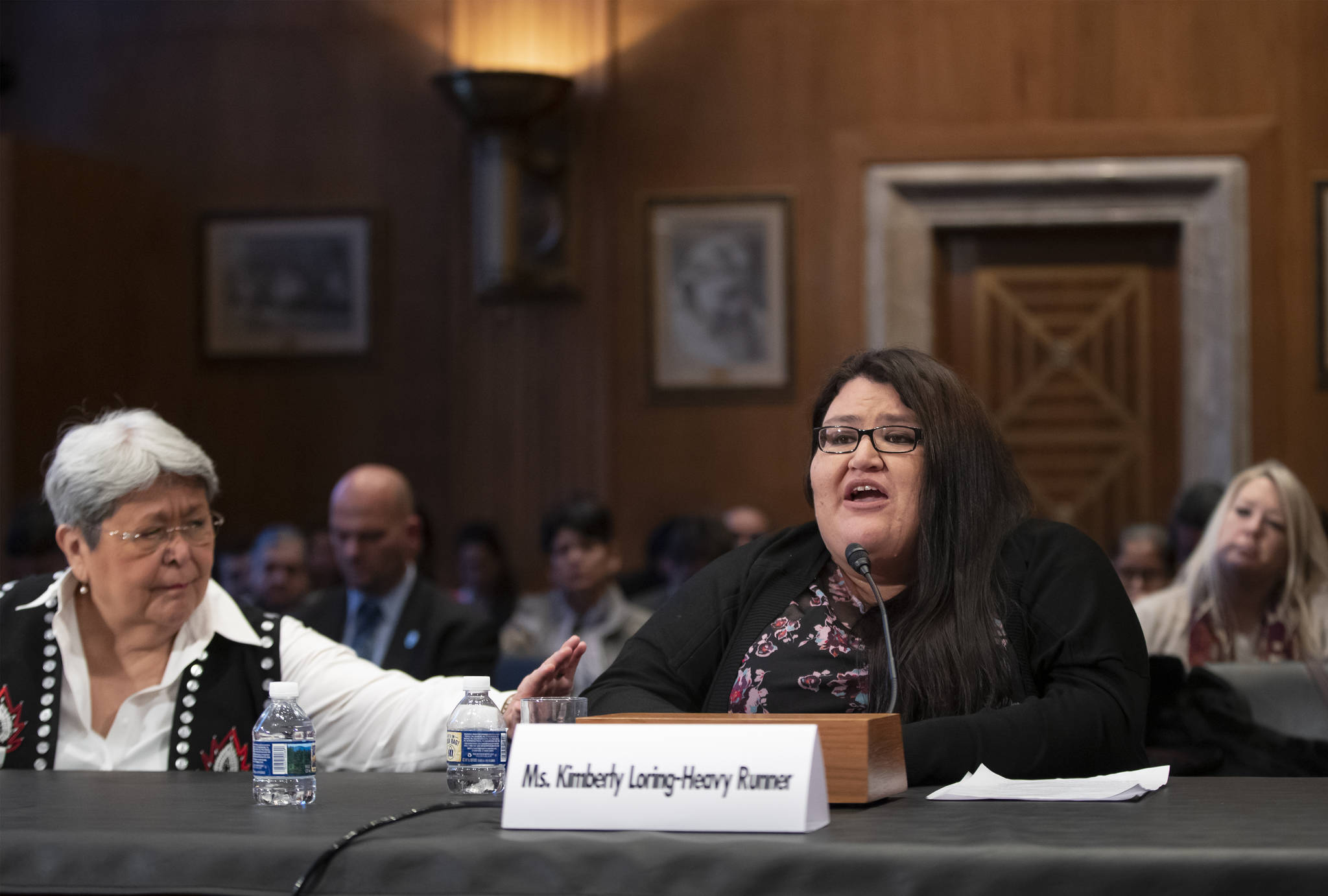 Kimberly Loring, right, whose sister, Ashley Loring HeavyRunner disappeared from the Blackfeet Reservation in Montana in 2017, is comforted by Patricia Alexander of the Tlingit and Haida Indian Tribes of Alaska, left, as the Senate Committee on Indian Affairs holds a hearing to examine concerns about investigations into the deaths and disappearance of Native American women, on Capitol Hill in Washington, Wednesday, Dec. 12, 2018. (AP Photo | J. Scott Applewhite)