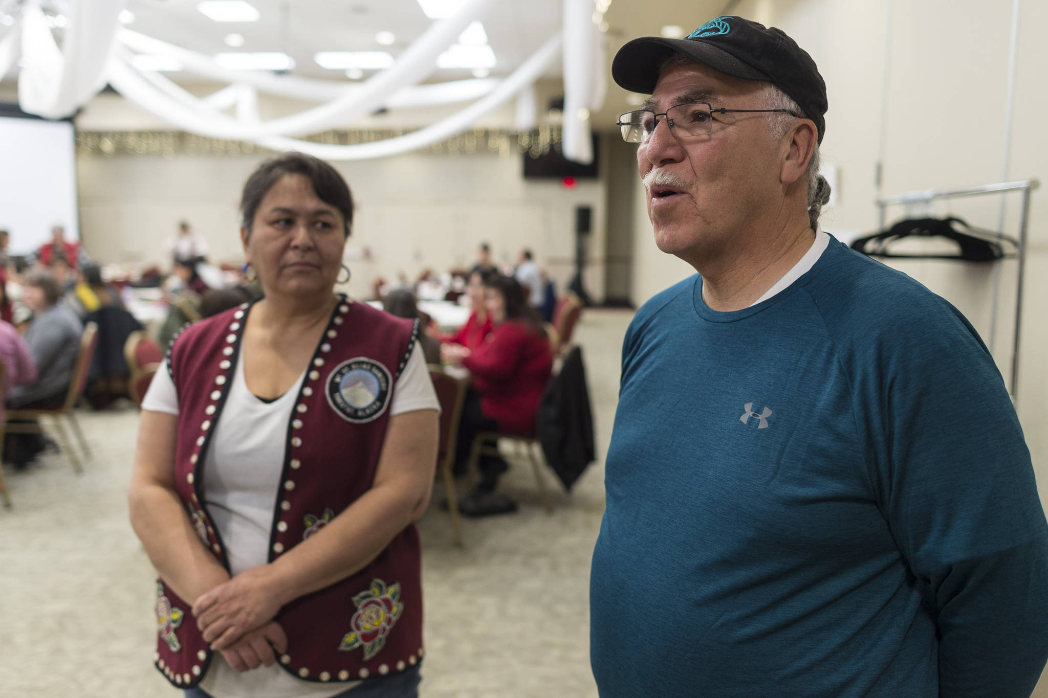 Cathy Bremner, the vice president of Yakutat Tlingit Tribe, and Larry Bemis, council member of Yakutat Tlingit Tribe, speak about the Tribal Court Roundup held at the Elizabeth Peratrovich Hall on Friday, Dec. 14, 2018. (Michael Penn | Juneau Empire)