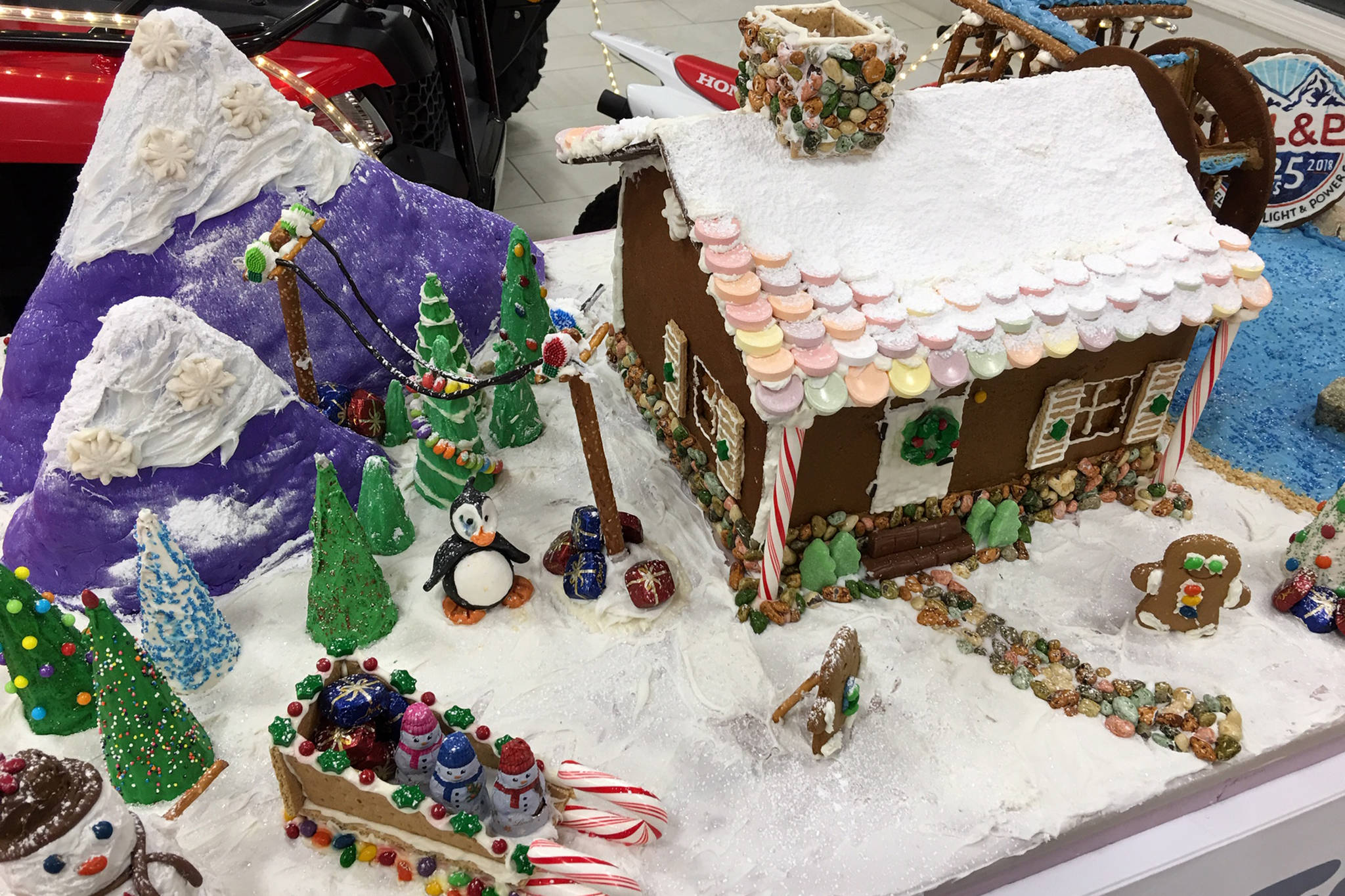 AEL&P made a gingerbread house that included a water wheel and a loaded slay. Ten businesses supporting 10 nonprofits made gingerbread structures for a fundraising contest that ended Wednesday, Dec. 19, 2018. (Courtesy Photo | Mendenhall Auto Center)