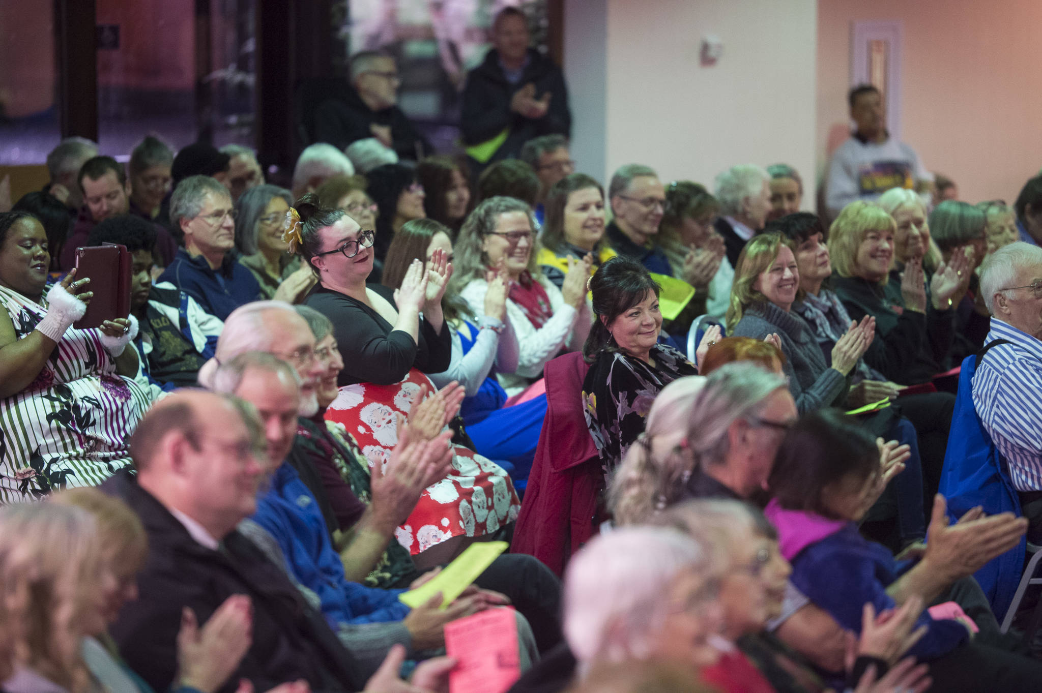 Juneau residents fill the seats for the Juneau Cabaret’s third annual Holiday Extravaganza at Centennial Hall on Wednesday, Dec. 19, 2018. (Michael Penn | Juneau Empire)