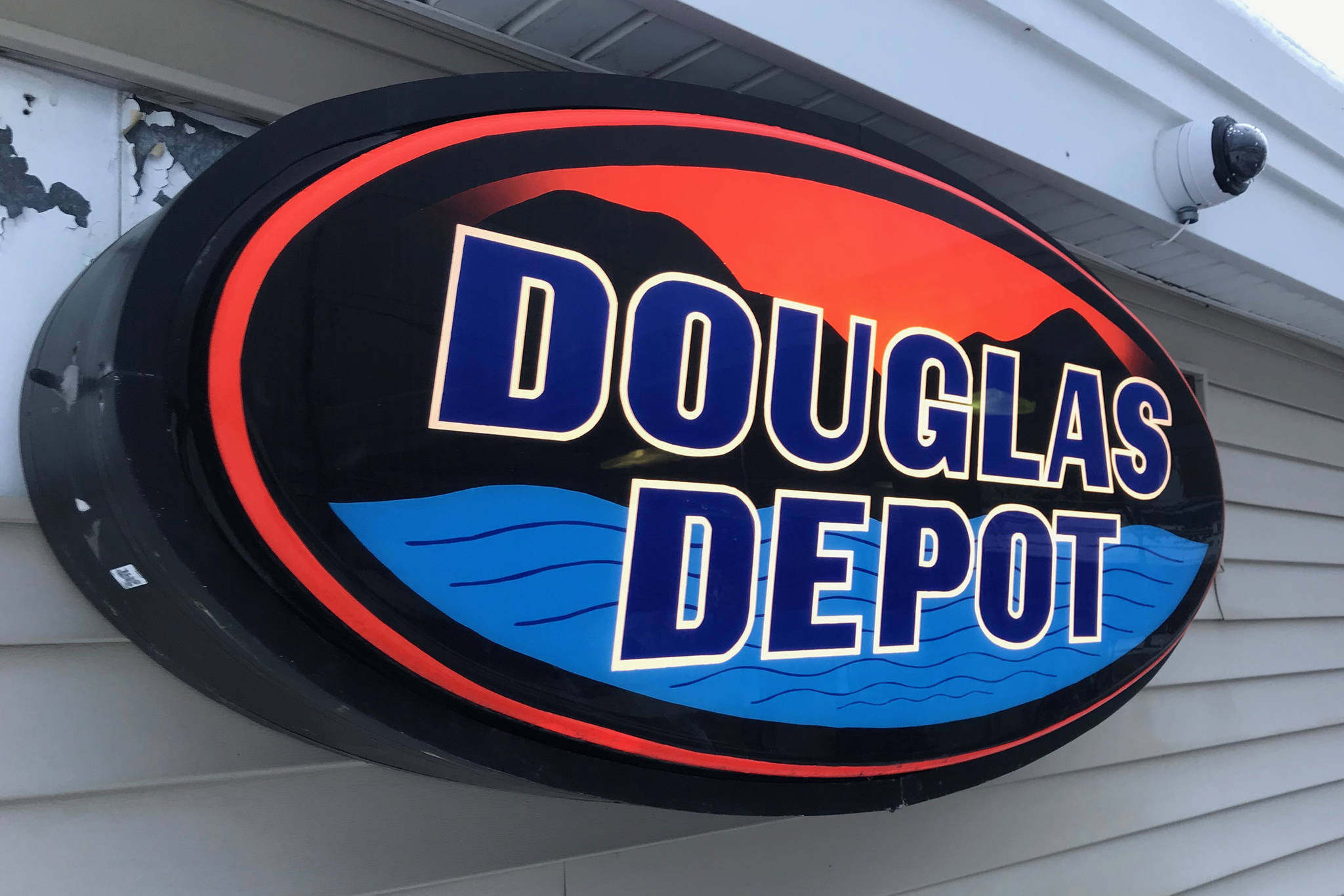 The sign for the Douglas Depot is pictured on Dec. 24, 2018. The convenience store and gas station opened in November. (Alex McCarthy | Juneau Empire)