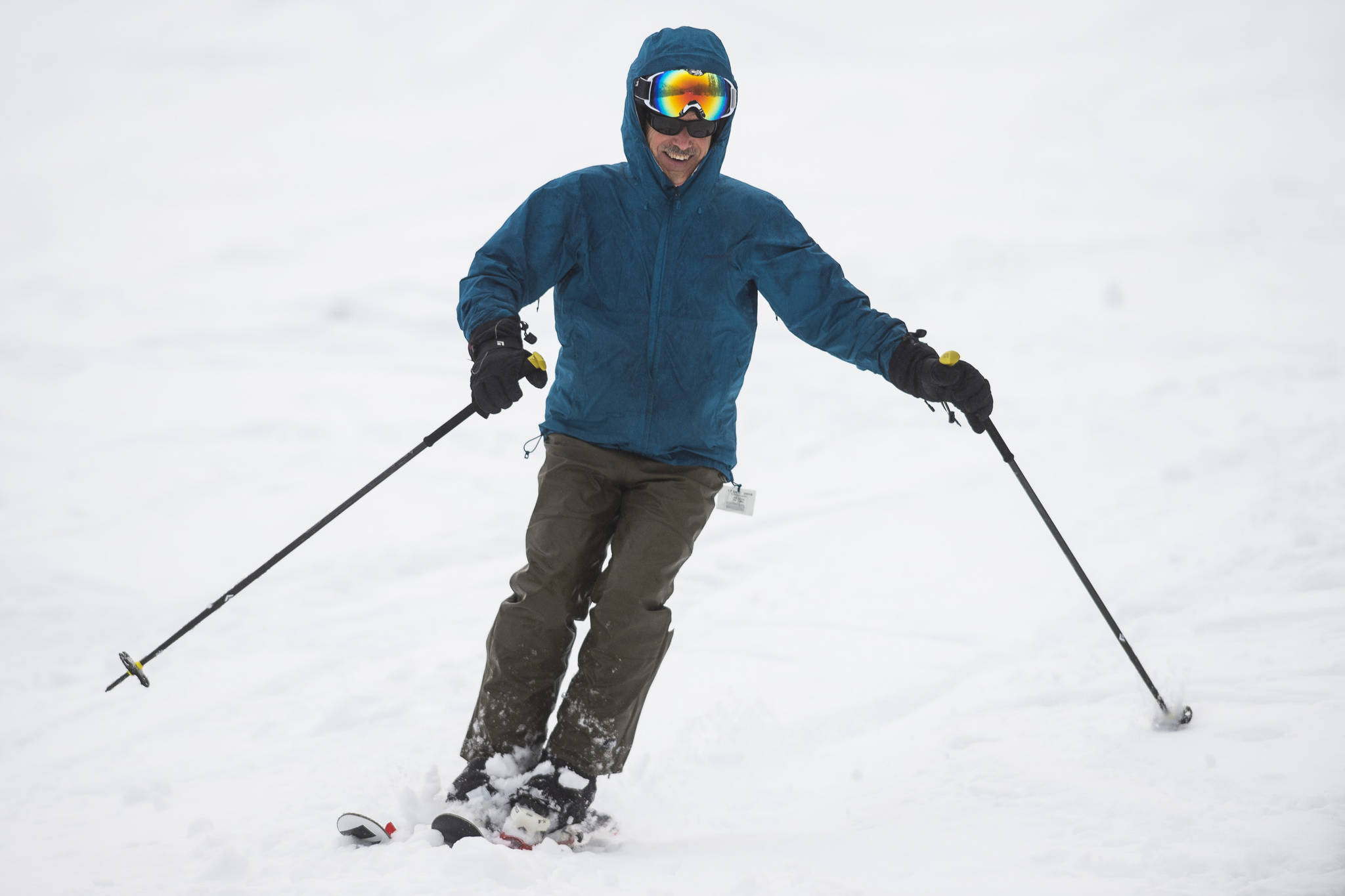 Jeff Sloss takes a first run after the Hooter Chairlift opened for the first time this season at Eaglecrest on Monday, Dec. 17, 2018. (Michael Penn | Juneau Empire)