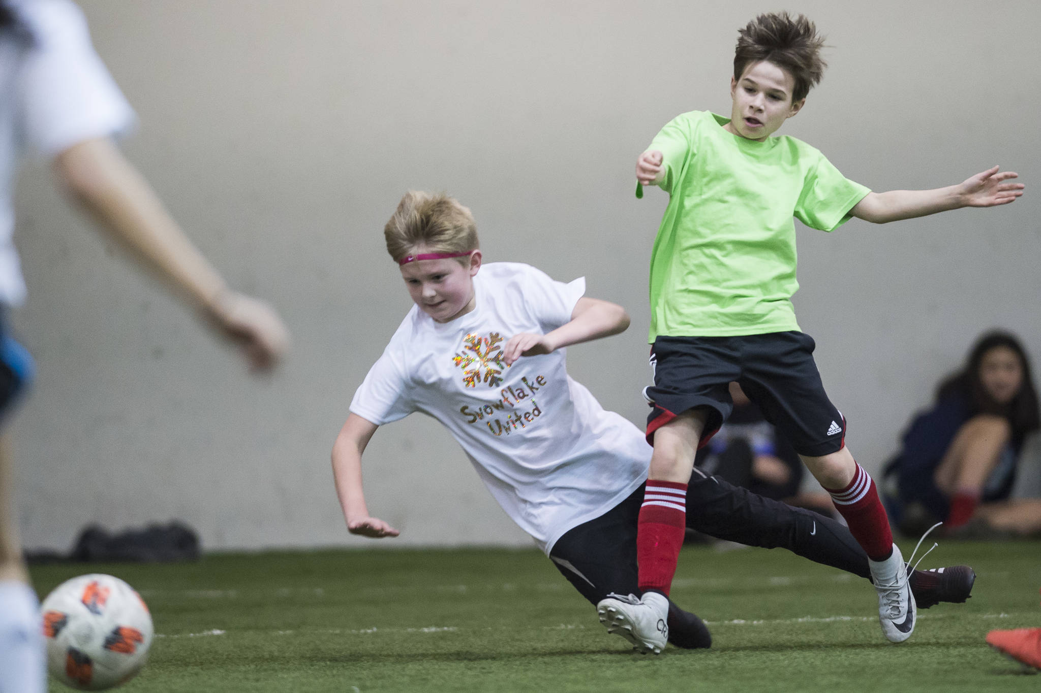 Snowflake United plays against Missile Toes at the annual Holiday Cup Soccer Tournament at the Wells Fargo Dimond Park Field House on Wednesday, Dec. 26, 2018. (Michael Penn | Juneau Empire)