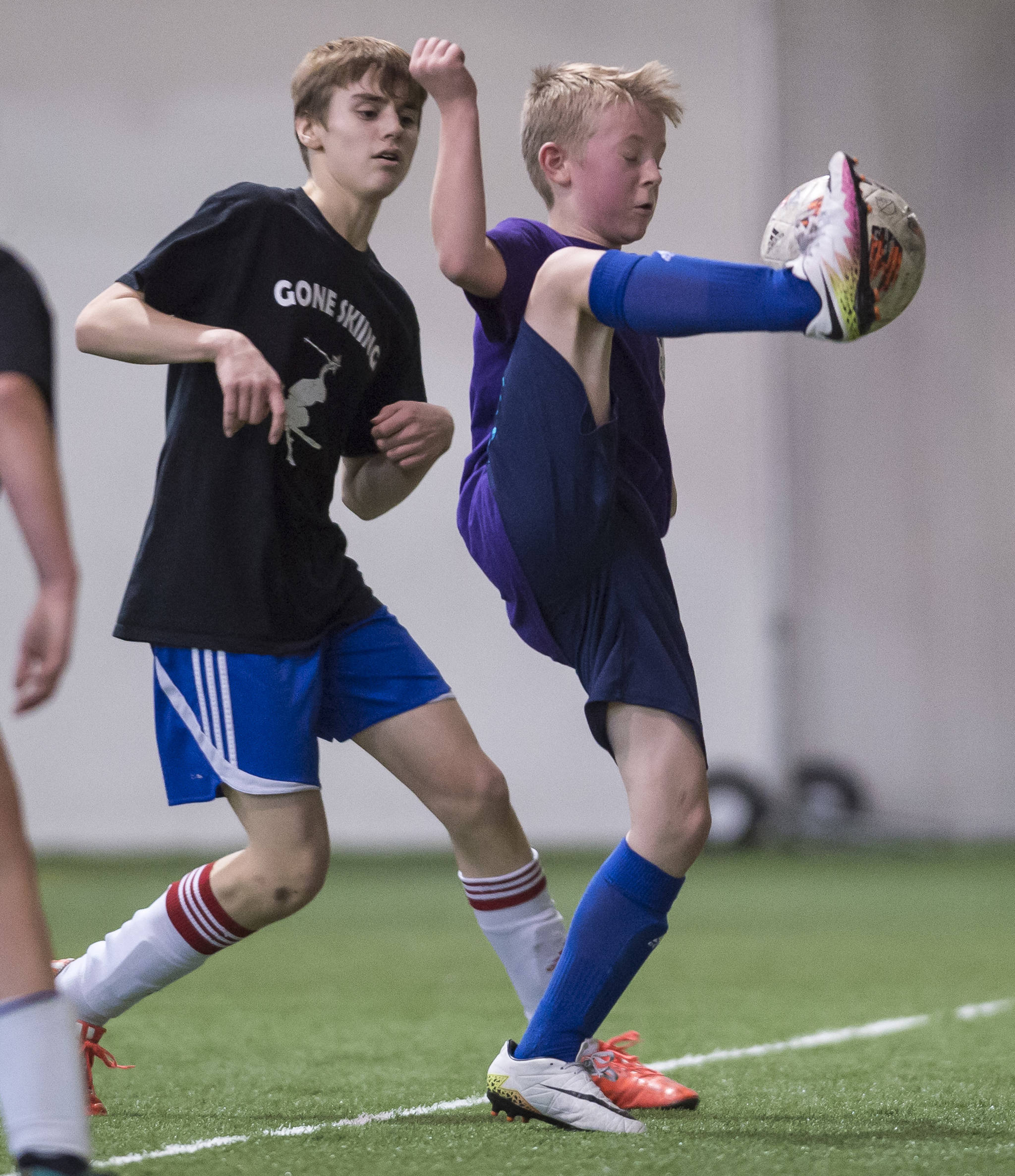 Grumpsicles play against Gone Skiing at the annual Holiday Cup Soccer Tournament at the Wells Fargo Dimond Park Field House on Wednesday, Dec. 26, 2018. (Michael Penn | Juneau Empire)