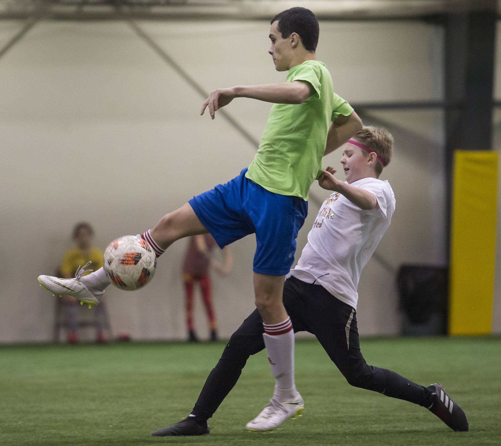 Snowflake United plays against Missile Toes at the annual Holiday Cup Soccer Tournament at the Wells Fargo Dimond Park Field House on Wednesday, Dec. 26, 2018. (Michael Penn | Juneau Empire)
