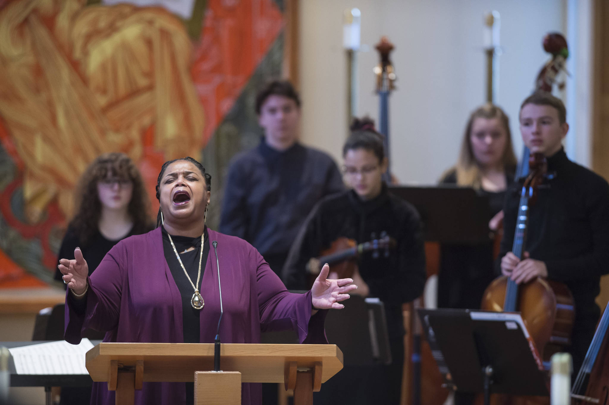 Sherry Patterson sings “The Lord’s Prayer” at the Dr. Martin Luther King Jr. 2019 Community Celebration at St. Paul’s Catholic Church on Monday, Jan. 21, 2019. (Michael Penn | Juneau Empire)
