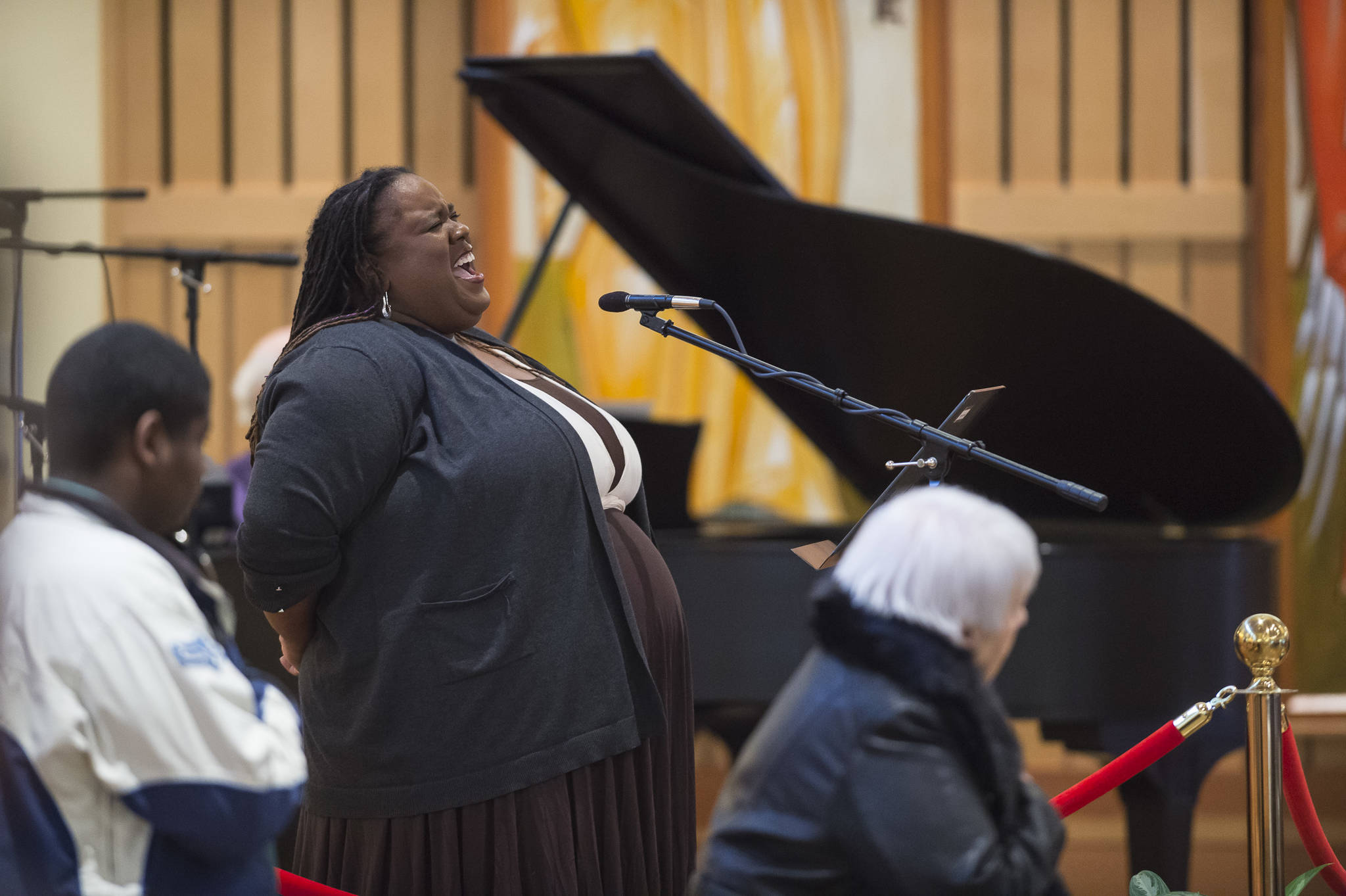 Jocelyn Miles sings the National Anthem at the Dr. Martin Luther King Jr. 2019 Community Celebration at St. Paul’s Catholic Church on Monday, Jan. 21, 2019. (Michael Penn | Juneau Empire)