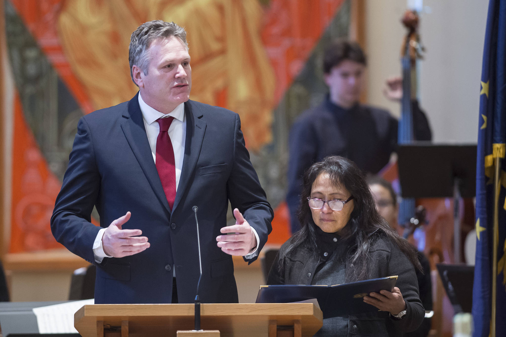 Gov. Michael J. Dunleavy, with his wife, Rose, anounces the proclamation of Dr. Martin Luther King Jr. Day at the Dr. Martin Luther King Jr. 2019 Community Celebration at St. Paul’s Catholic Church on Monday, Jan. 21, 2019. (Michael Penn | Juneau Empire)