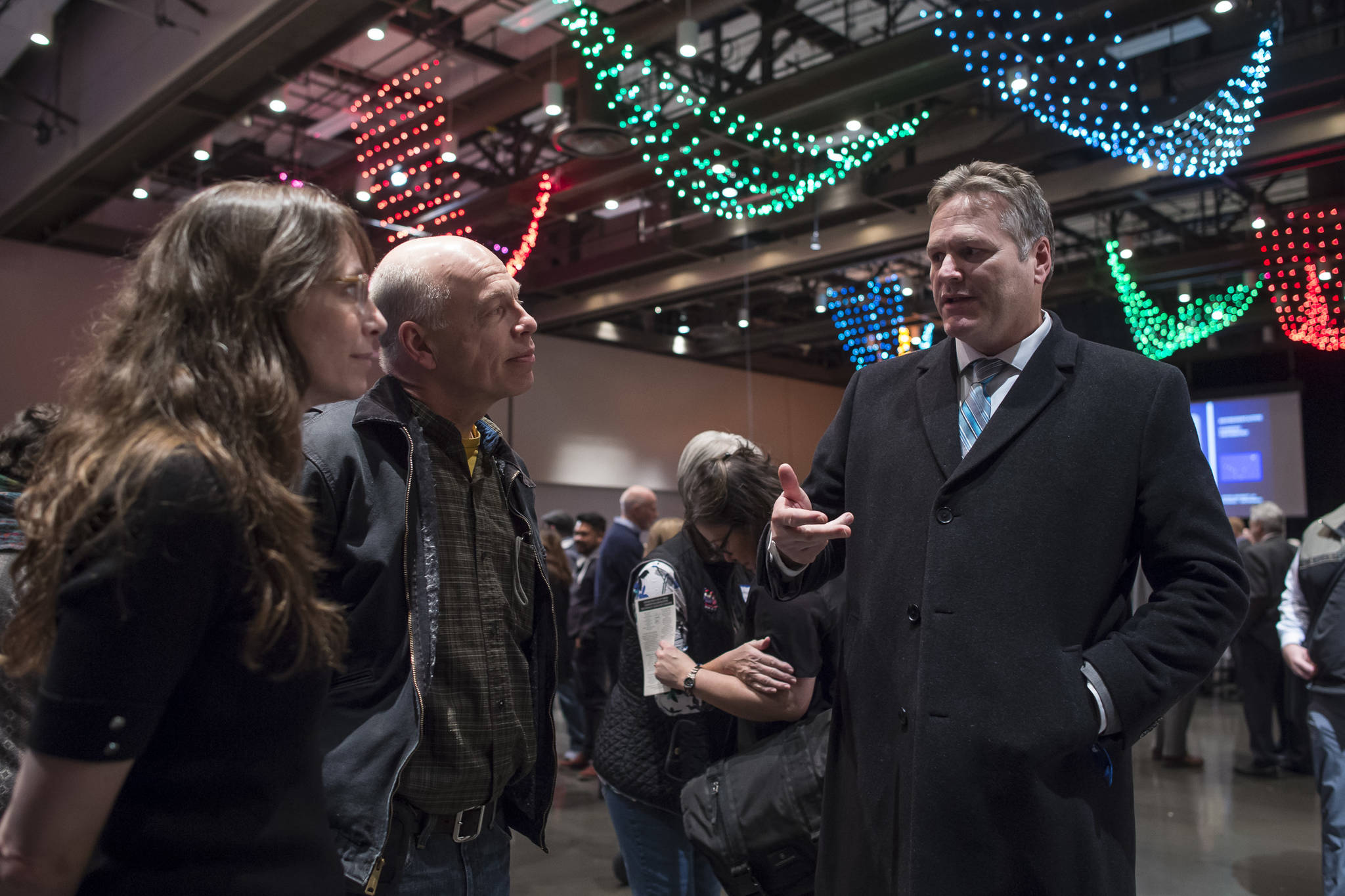 Irene Gallion and Eric Nelson meet with Gov. Michael J. Dunleavy at the 34th Annual Community Welcome Reception at Centennial Hall on Wednesday, Jan. 16, 2019. The reception is funded by donations from businesses, organizations and individuals. (Michael Penn | Juneau Empire)