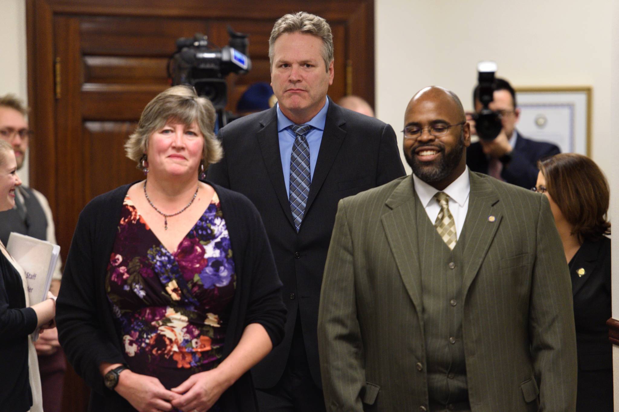 Gov. Mike Dunleavy gives his State of the State speech in the House chamber at the Capitol in Juneau, Alaska, as Senate President Cathy Giessel, R-Anchorage, left, and House Speaker Pro Tempore Neal Foster, D-Nome, listen during a Joint Session of the Alaska Legislature on Tuesday, Jan. 22, 2019. (Michael Penn | Juneau Empire)
