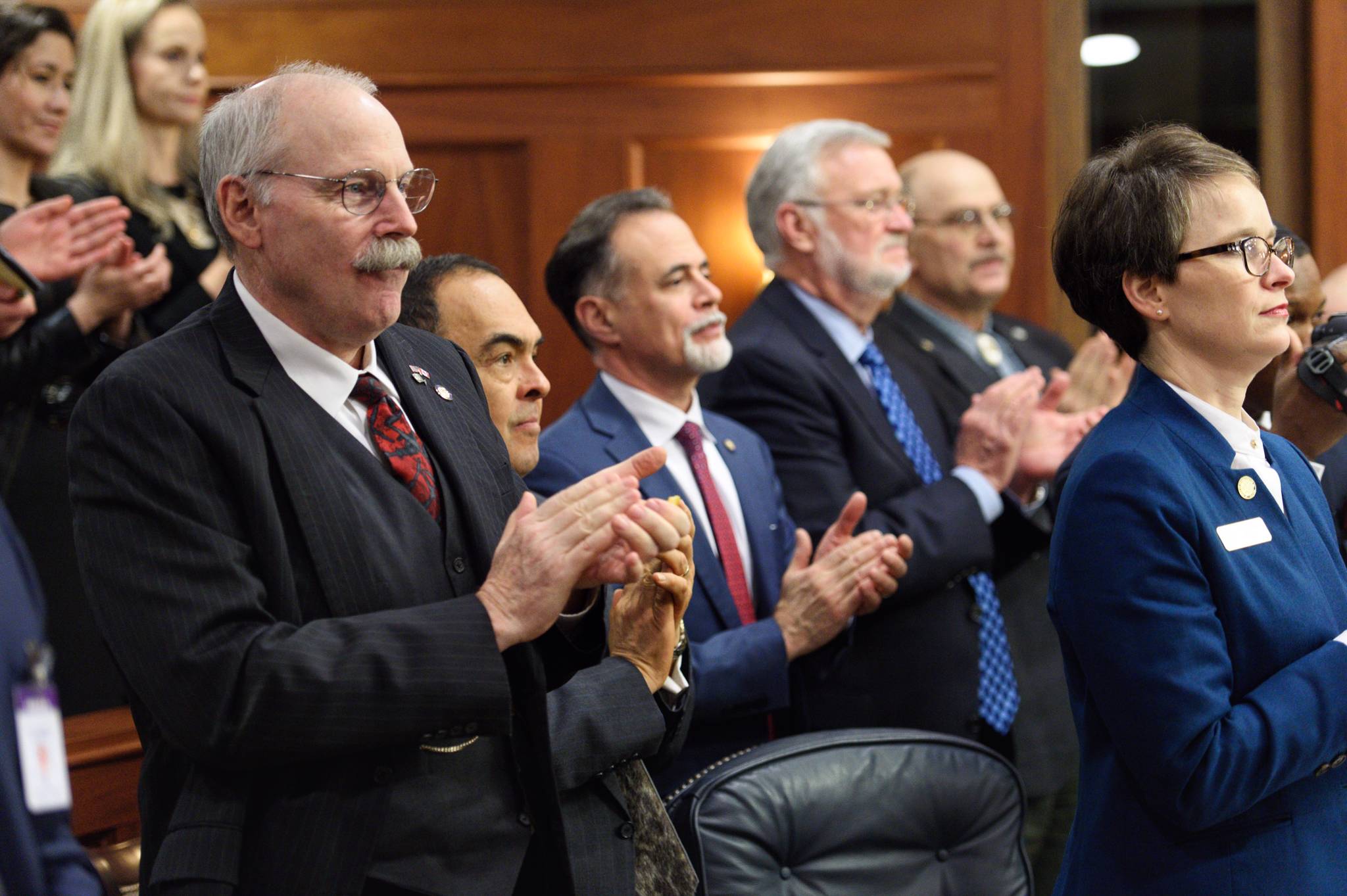 Senators react to Gov. Mike Dunleavy’s State of the State address on Tuesday. (Michael Penn | Juneau Empire)