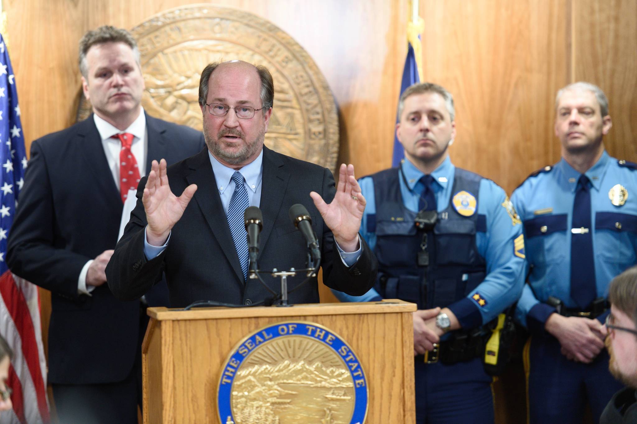 Alaska Attorney General Kevin Clarkson describes four new crimes bills at a press conference with Gov. Mike Dunleavy, left, and Alaska State Troopers at the Capitol on Wednesday, Jan. 23, 2019. (Michael Penn | Juneau Empire)