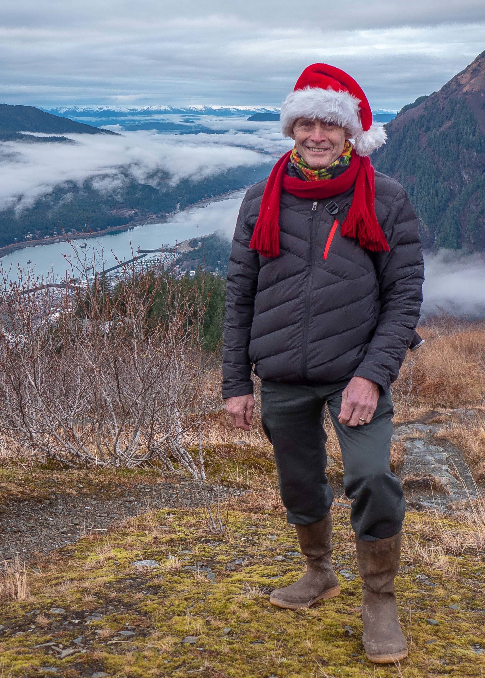 Dec. 9, 2018: On this gray December day, it sure didn’t look much like winter. But that didn’t stop Mark Miller from getting into the holiday spirit on a hike with friends above the tram. Mandatory wardrobe for the mountain was his insulated jacket from Spyder, pants from Slates, and hiking boots from Le Chameau. His fleece neck gaiter, crimson chenille scarf and Santa’s hat brought color to the day and made everyone smile.