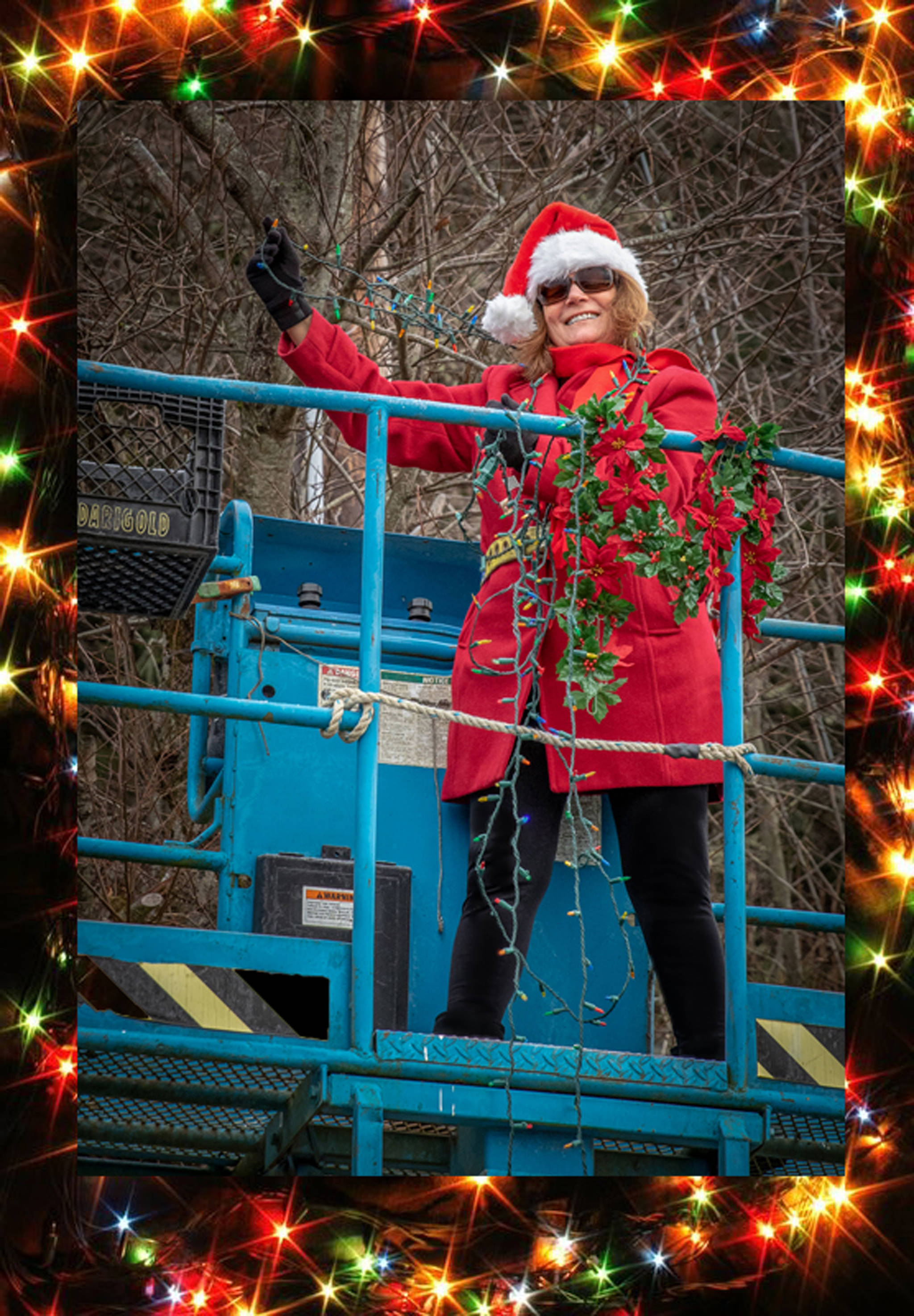 Dec. 23, 2018: Tis the season to enjoy the holidays in style. As part of an annual decorating tradition, Santa’s helper Mary Siroky recently assisted in hanging holiday lights at the Gitkov dock in Auke Bay. Her stylish outfit includes a requisite Santa’s hat, red jacket, red scarf and black pants and boots. And although her clothes were not tarnished with ashes or soot, she was wearing her requisite OSHA safety belt as she was hoisted into the air.