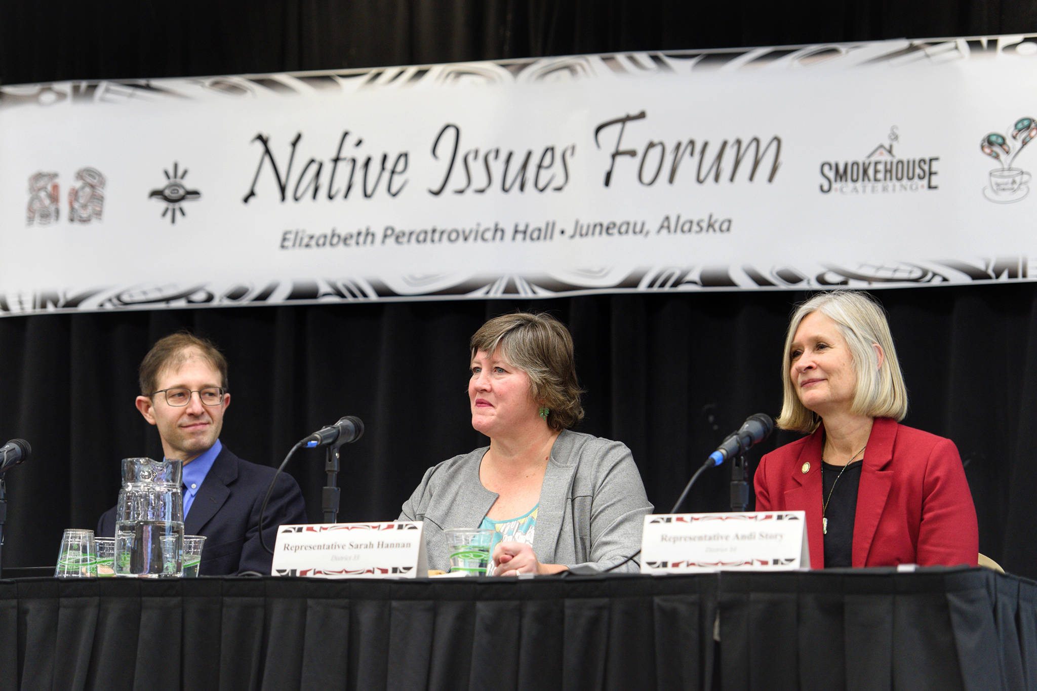 Sen. Jesse Kiehl, D-Juneau, left, Rep. Sara Hannan, D-Juneau, center, and Rep. Andi Story, D-Juneau, are introduced at the Native Issues Forum at the Elizabeth Peratrovich Hall on Wednesday,Jan. 23, 2019. (Michael Penn | Juneau Empire)