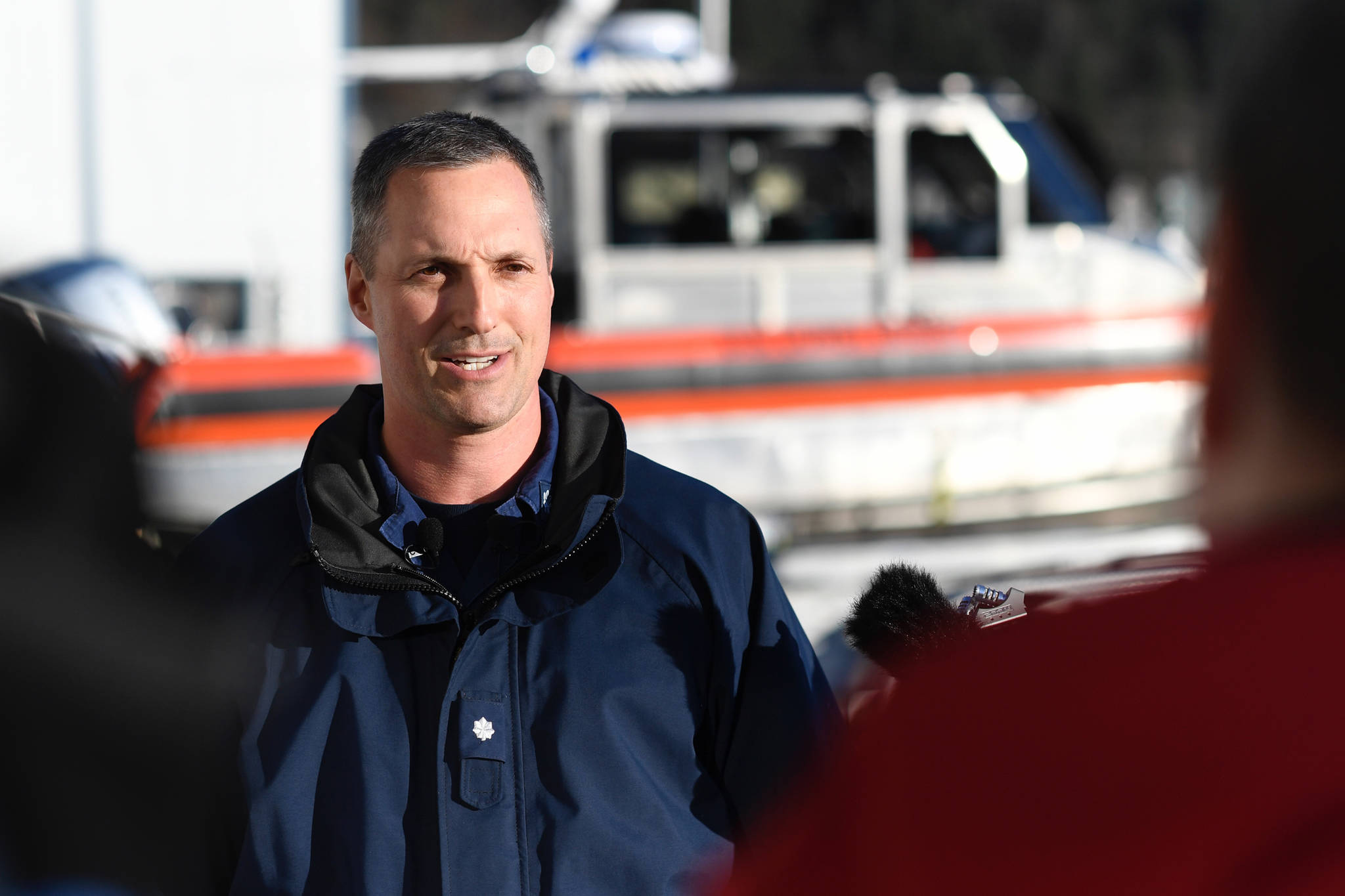 Commander Michael Kahle, of the U.S. Coast Guard, speaks during a press conference on Thursday, Jan. 31, 2019, at Coast Guard Station Juneau about the search for a missing plane near Kake. (Michael Penn | Juneau Empire)