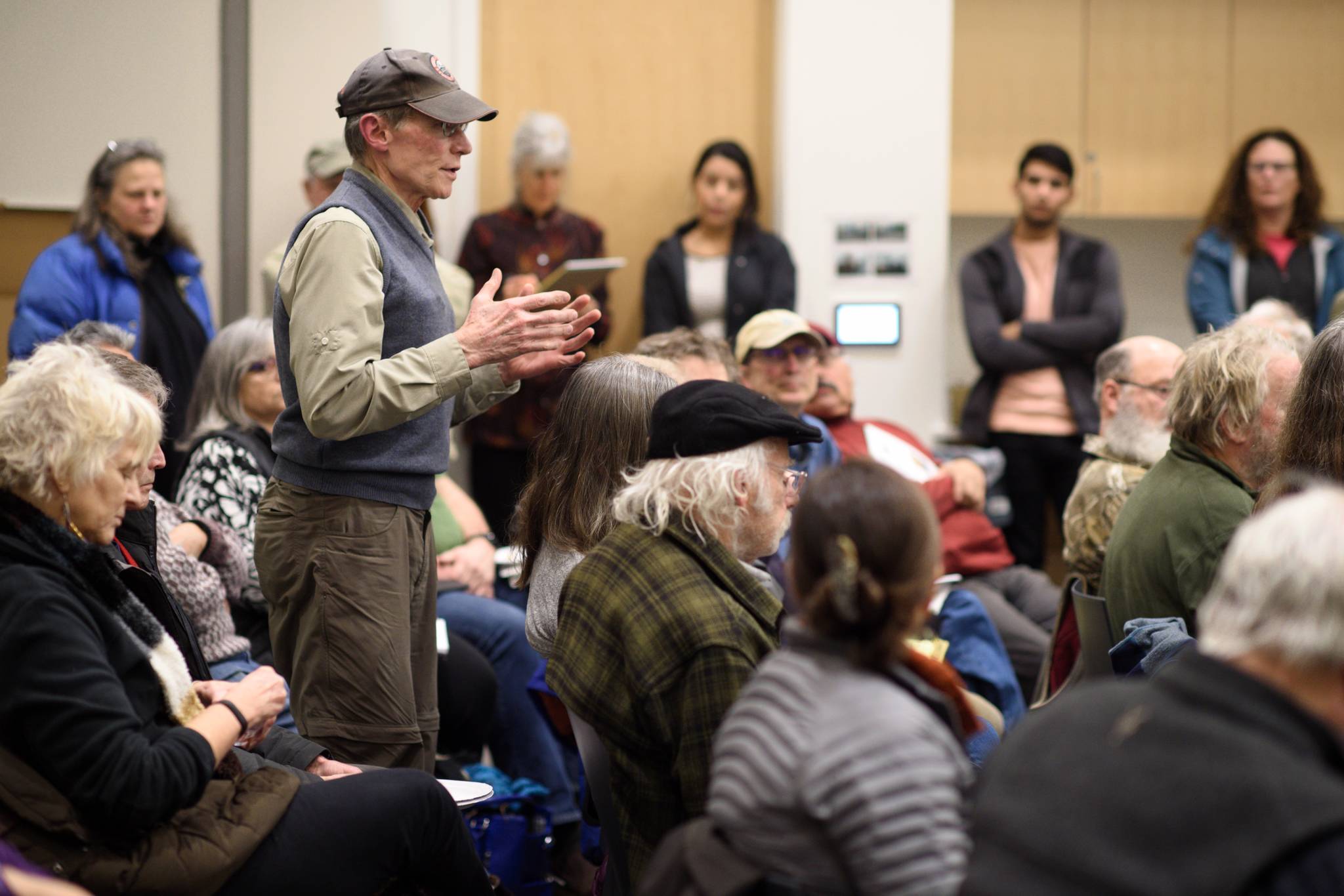 Gene Miller speaks up during a standing-room only town hall meeting featuring Juneau’s new legislators at the Mendenhall Valley Public Library on Tuesday, Jan. 29, 2019. (Michael Penn | Juneau Empire)