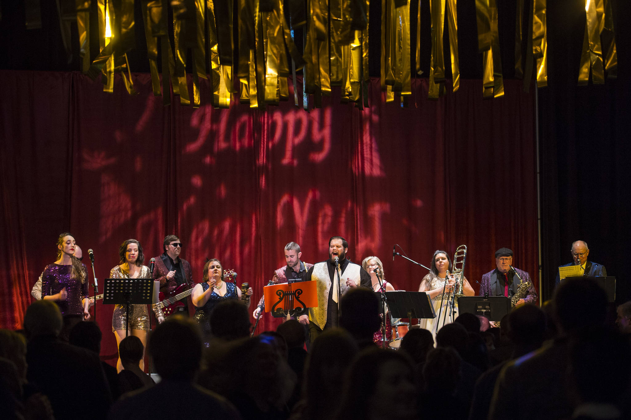 Juneau residents dance to Gamble & High Costa Livin’ during the New Year’s Eve Gala at Centennial Hall on Monday, Dec. 31, 2018. The event was a fundraiser for the Juneau Arts and Humanities Council and Juneau Jazz & Classics. (Michael Penn | Juneau Empire)