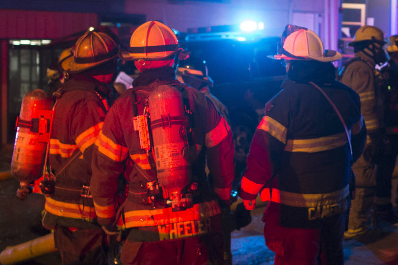 File photo of Juneau Capital City Fire/Rescue firefighters at work. (Michael Penn | Juneau Empire File)