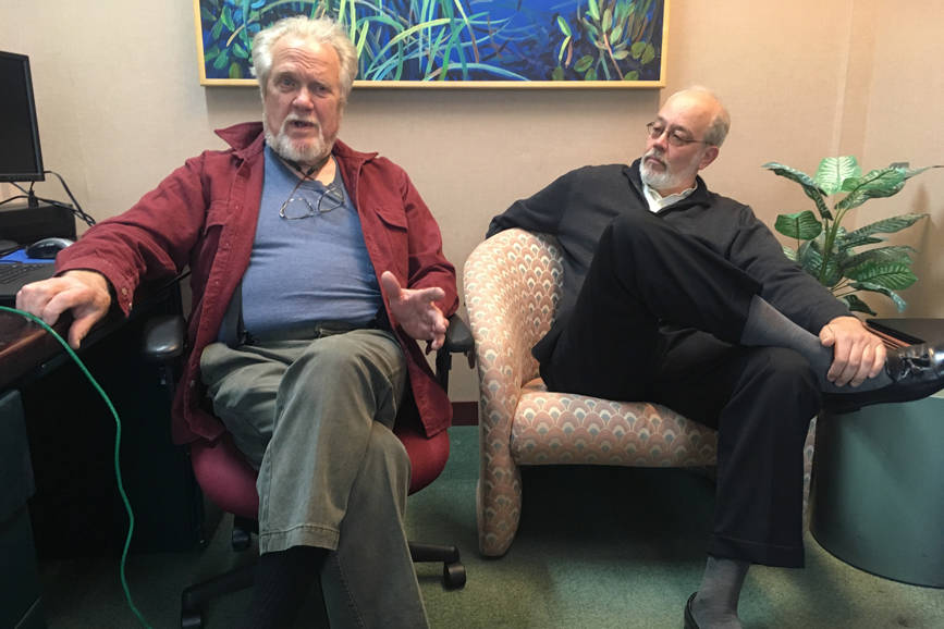 In this May 22, 2018 photo, Eric Forrer, left, and Joe Geldhof, right, discuss their lawsuit against the state of Alaska to stop a plan that calls for borrowing up to $1 billion from global bond markets to pay oil and gas tax credits owed by the state. (James Brooks | Juneau Empire File)