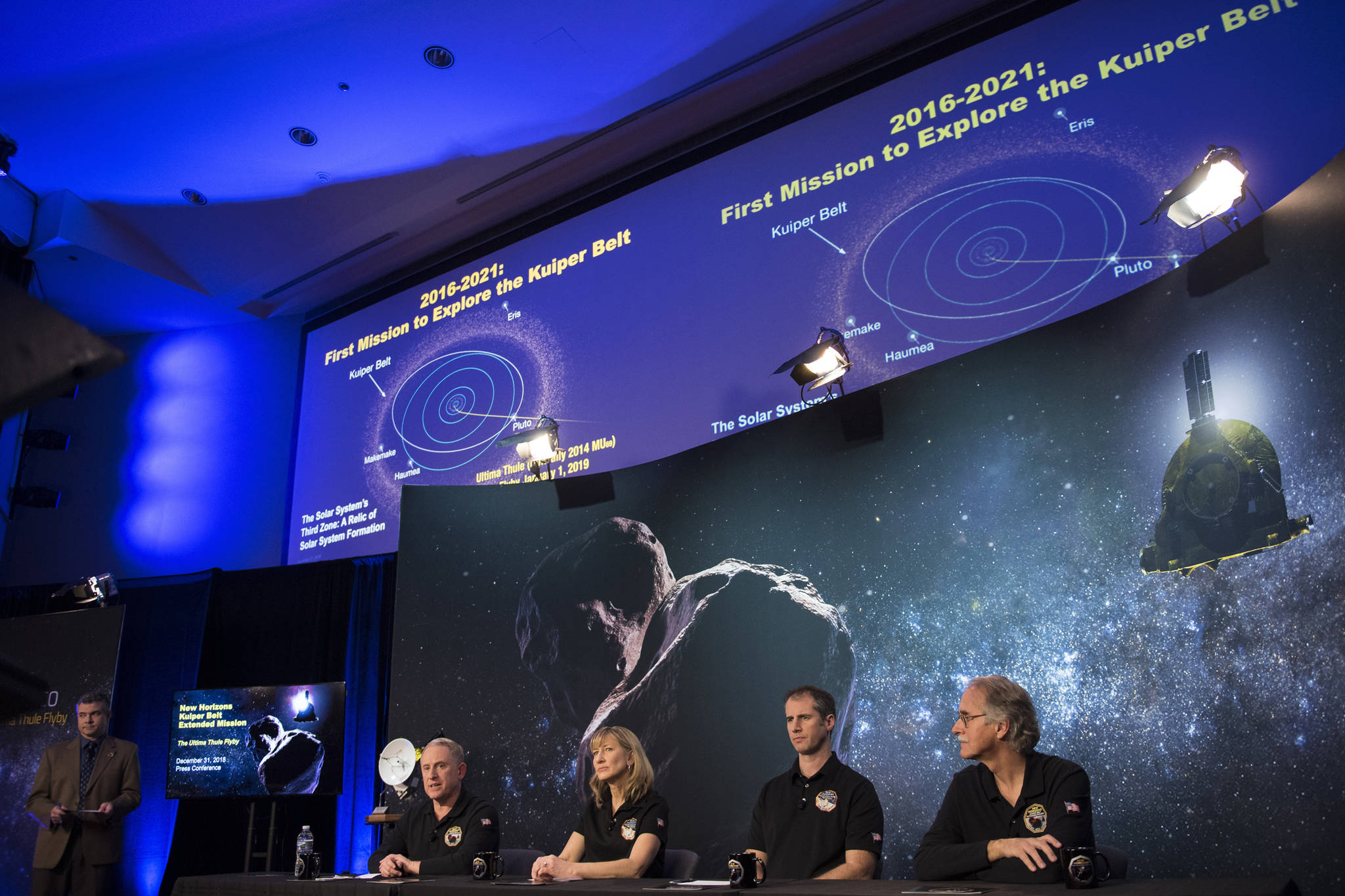 New Horizons principal investigator Alan Stern of the Southwest Research Institute, left, New Horizons project manager Helene Winters of the Johns Hopkins University Applied Physics Laboratory, second from left, Fred Pelletier, lead of the project navigation team at KinetX Inc., second from right, and New Horizons co-investigator John Spencer of the Southwest Research Institute, right, are seen during a press conference prior to the flyby of Ultima Thule by the New Horizons spacecraft, Monday, Dec. 31, 2018 at Johns Hopkins University Applied Physics Laboratory (APL) in Laurel, Maryland. (Joel Kowsky | NASA via the Associated Press)
